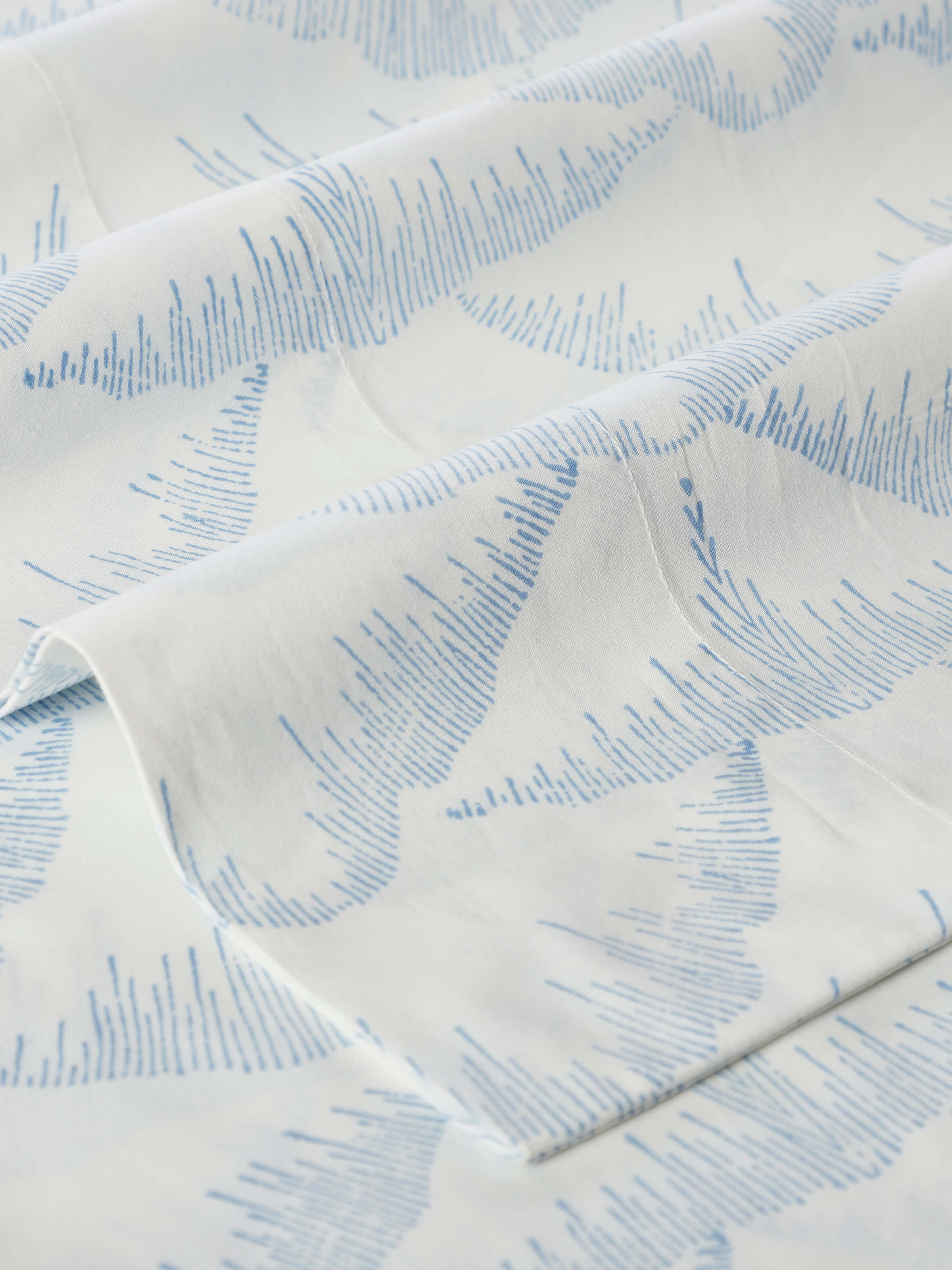 Detailed view of Parvat blue textured cotton Sanganeri block printed queen bedsheet set showcasing the design and print quality