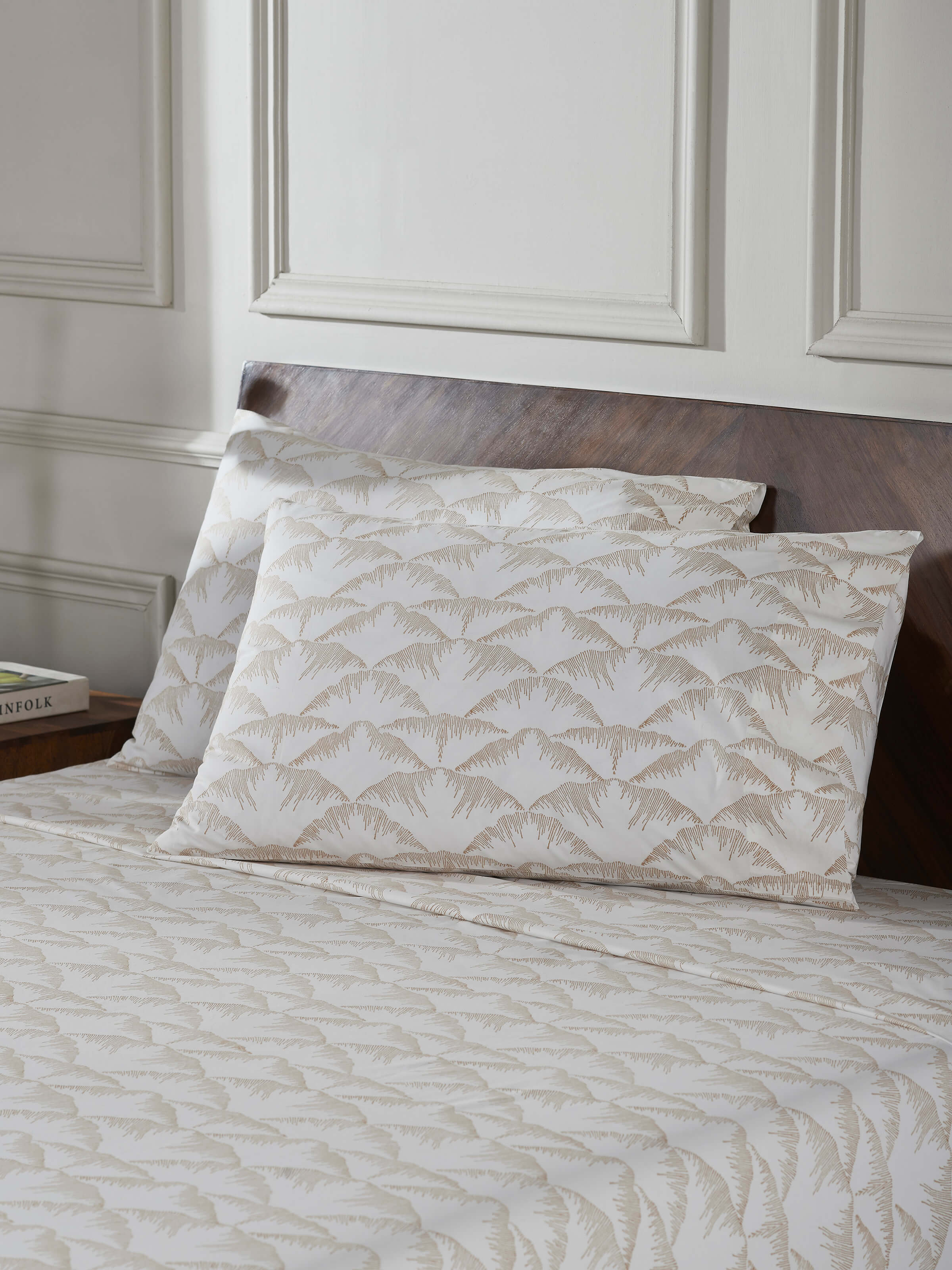 Close-up of the Parvat beige textured cotton Sanganeri block printed king bedsheet set, highlighting the block print design.