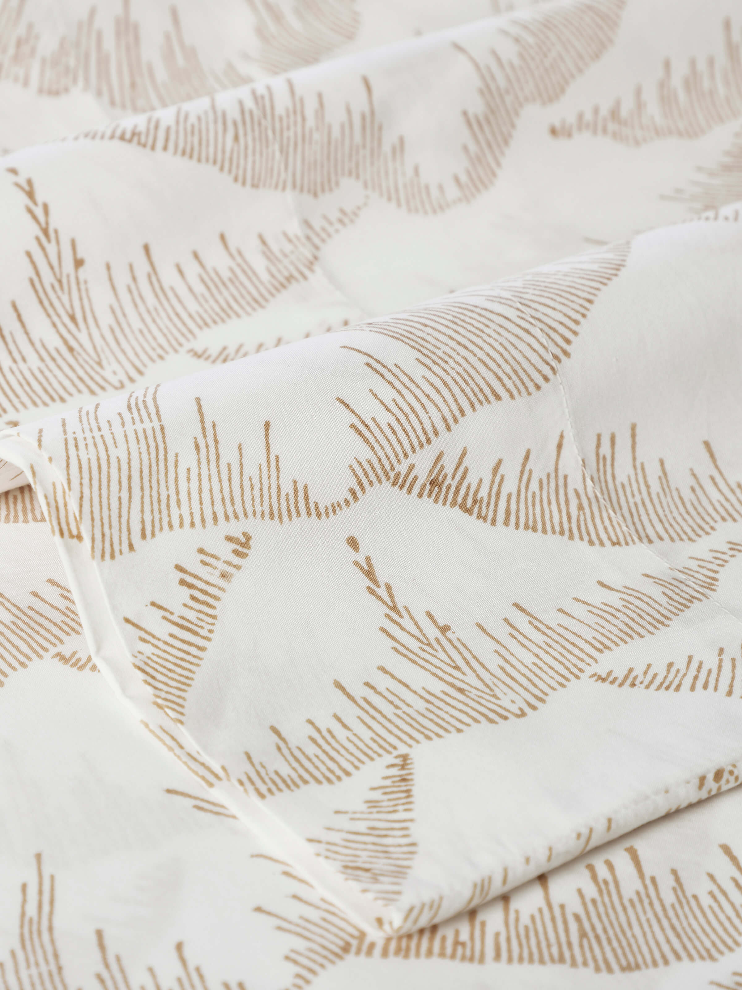 Detailed view of the Parvat beige textured cotton Sanganeri block printed king bedsheet set, showcasing the intricate block print.