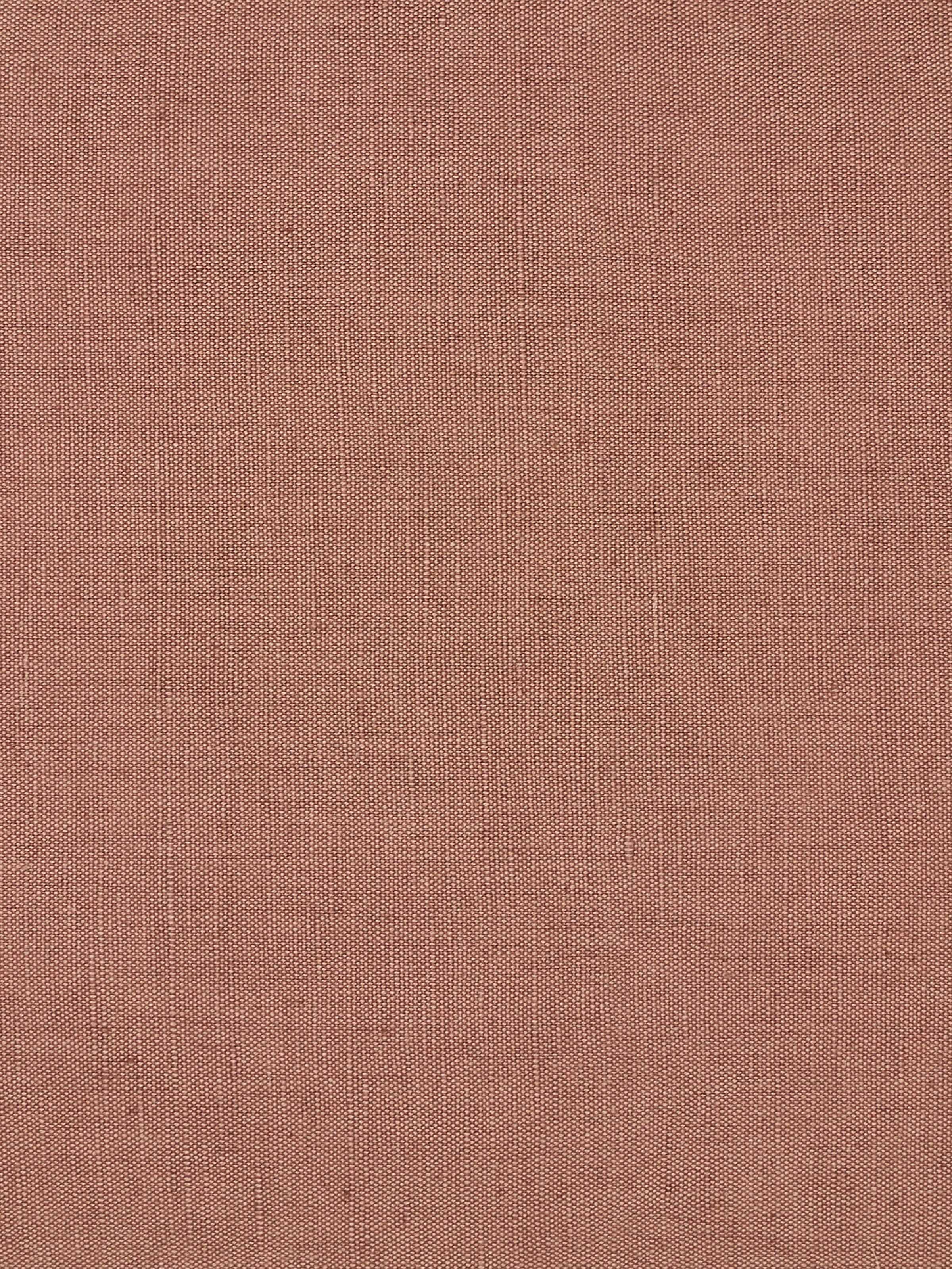 Full view of Parvat brown edge stitch linen cotton cushion cover displaying its edge stitch embroidery in a styled setting