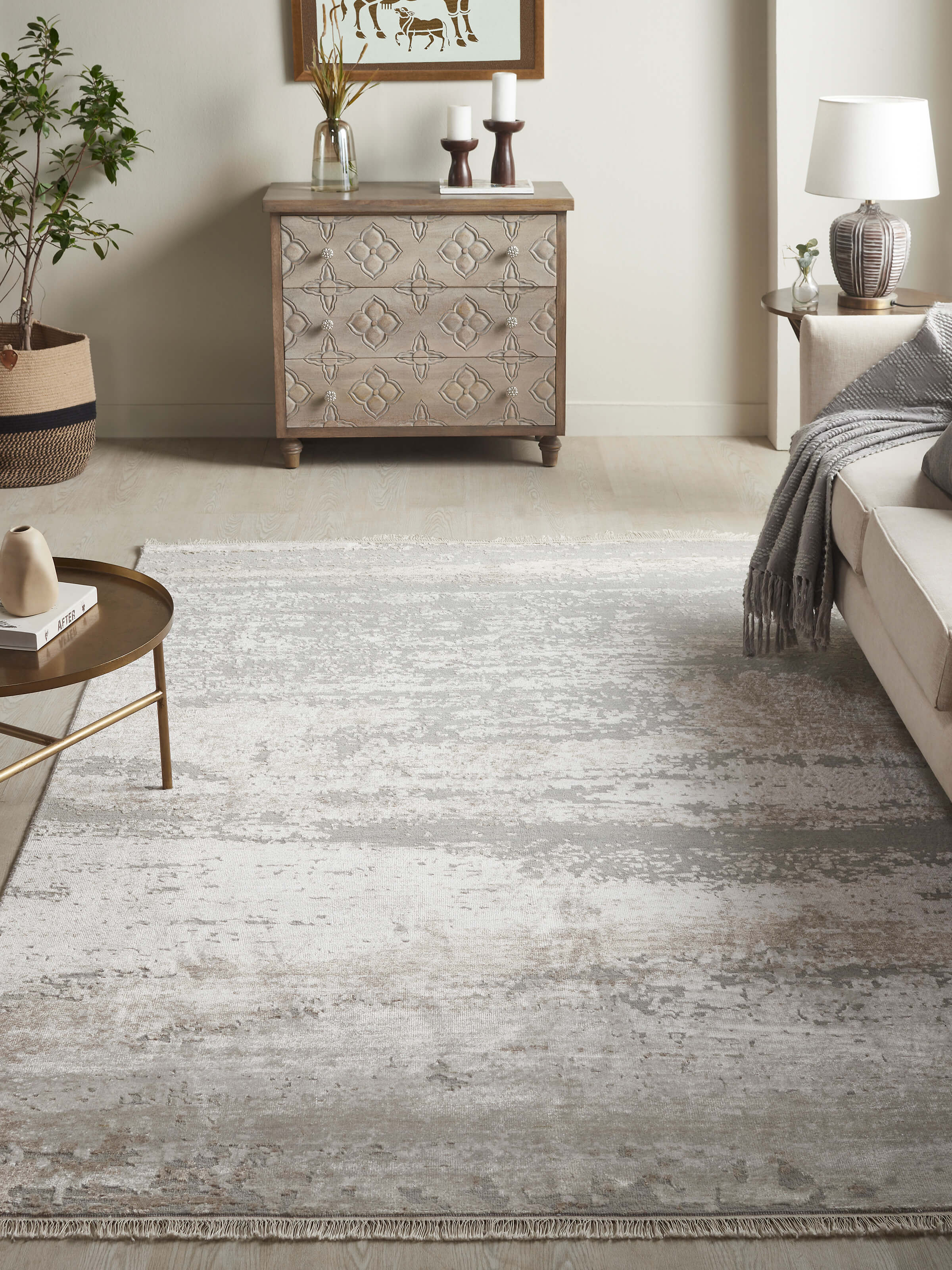 Grey taupe abstract Agra carpet styled in a modern interior setting