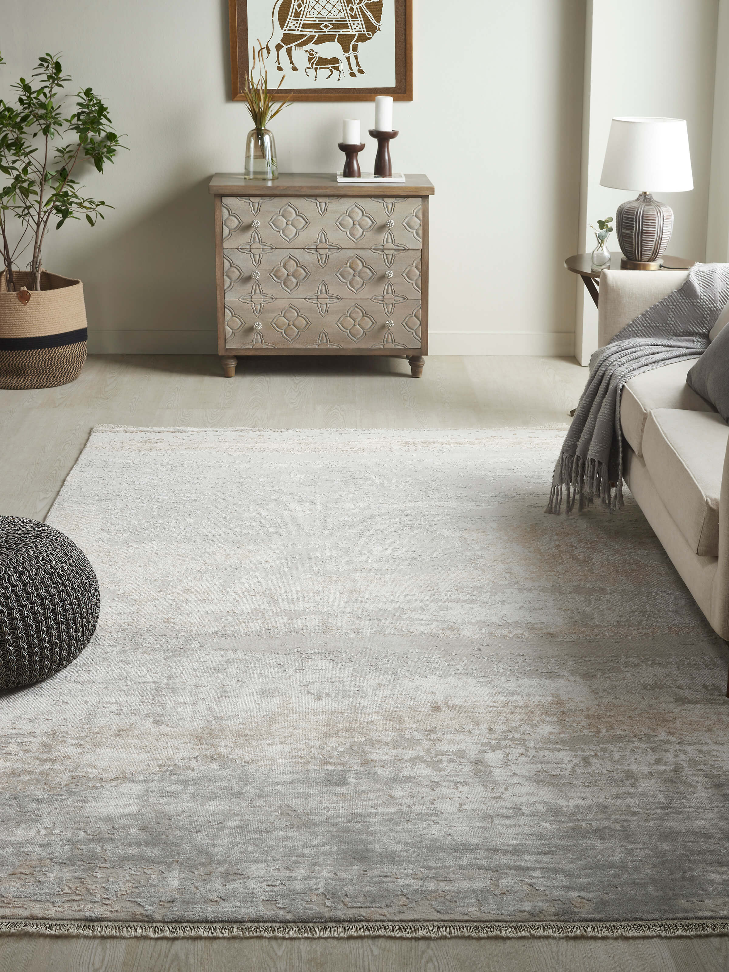 Grey beige abstract Agra wool and viscose rug styled in neutral-toned interior