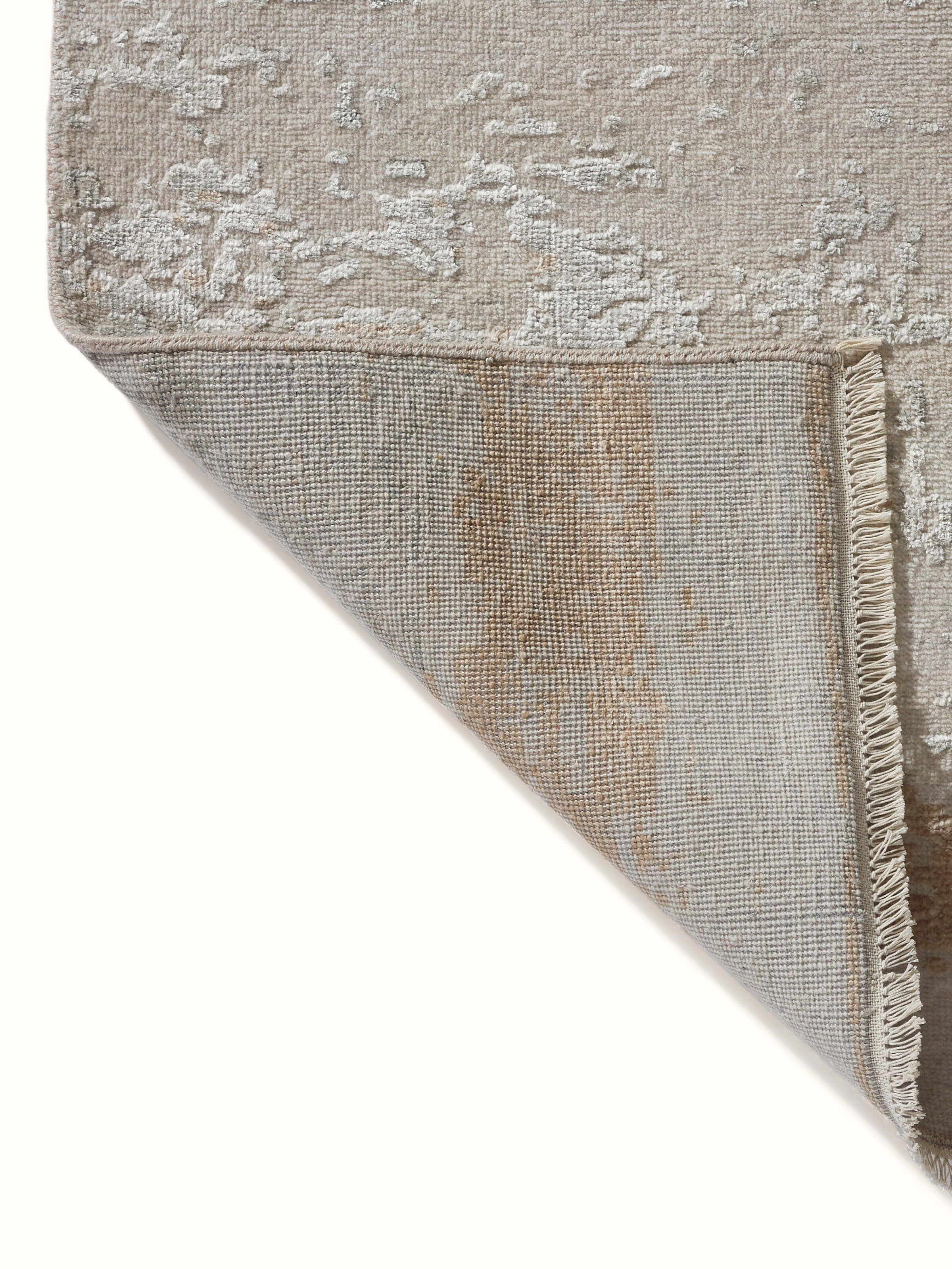 Back side of grey beige modern abstract Agra wool and viscose rug