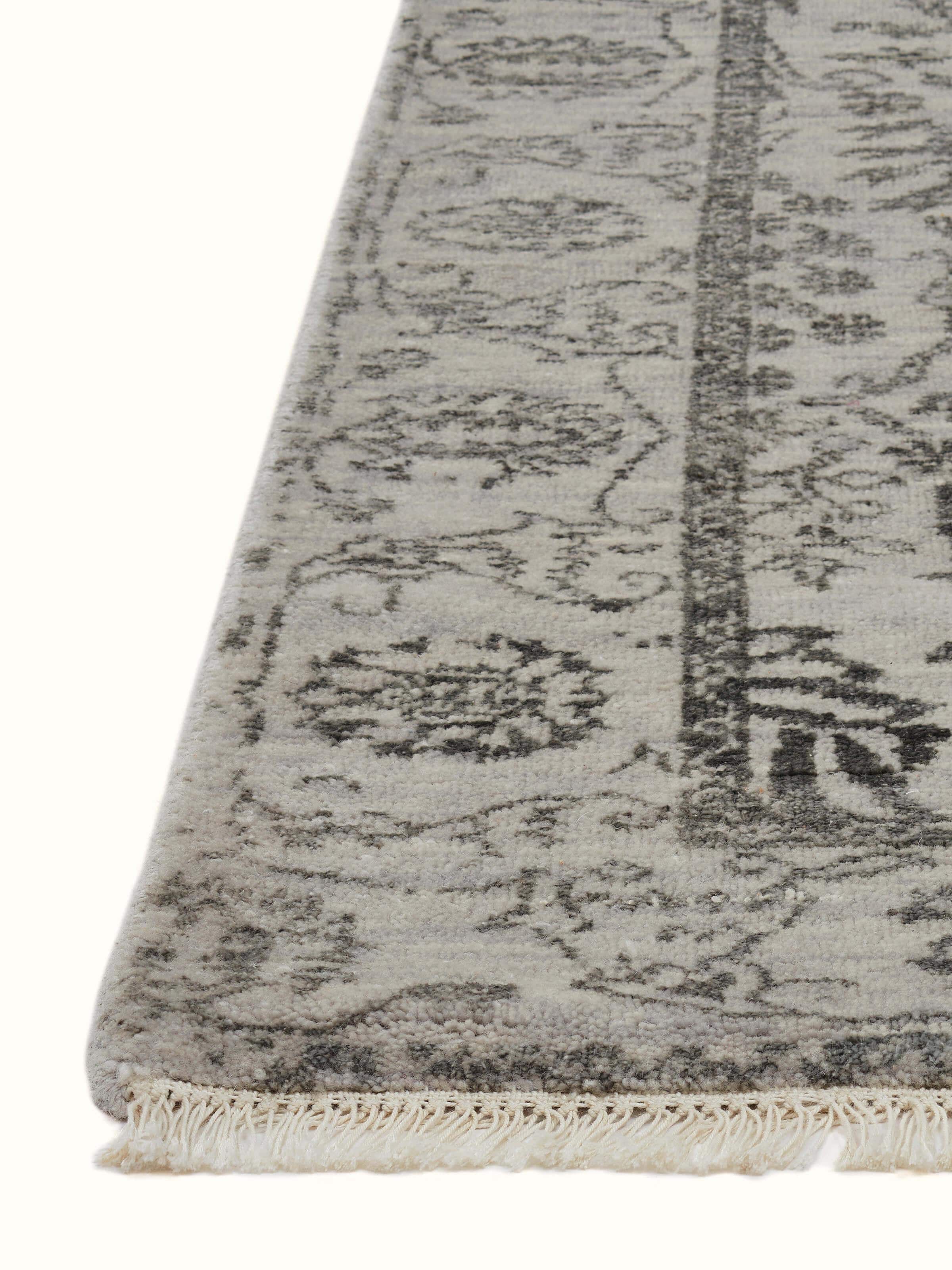 Detailed view of distressed transitional grey charcoal Agra wool & viscose hand-knotted runner.
