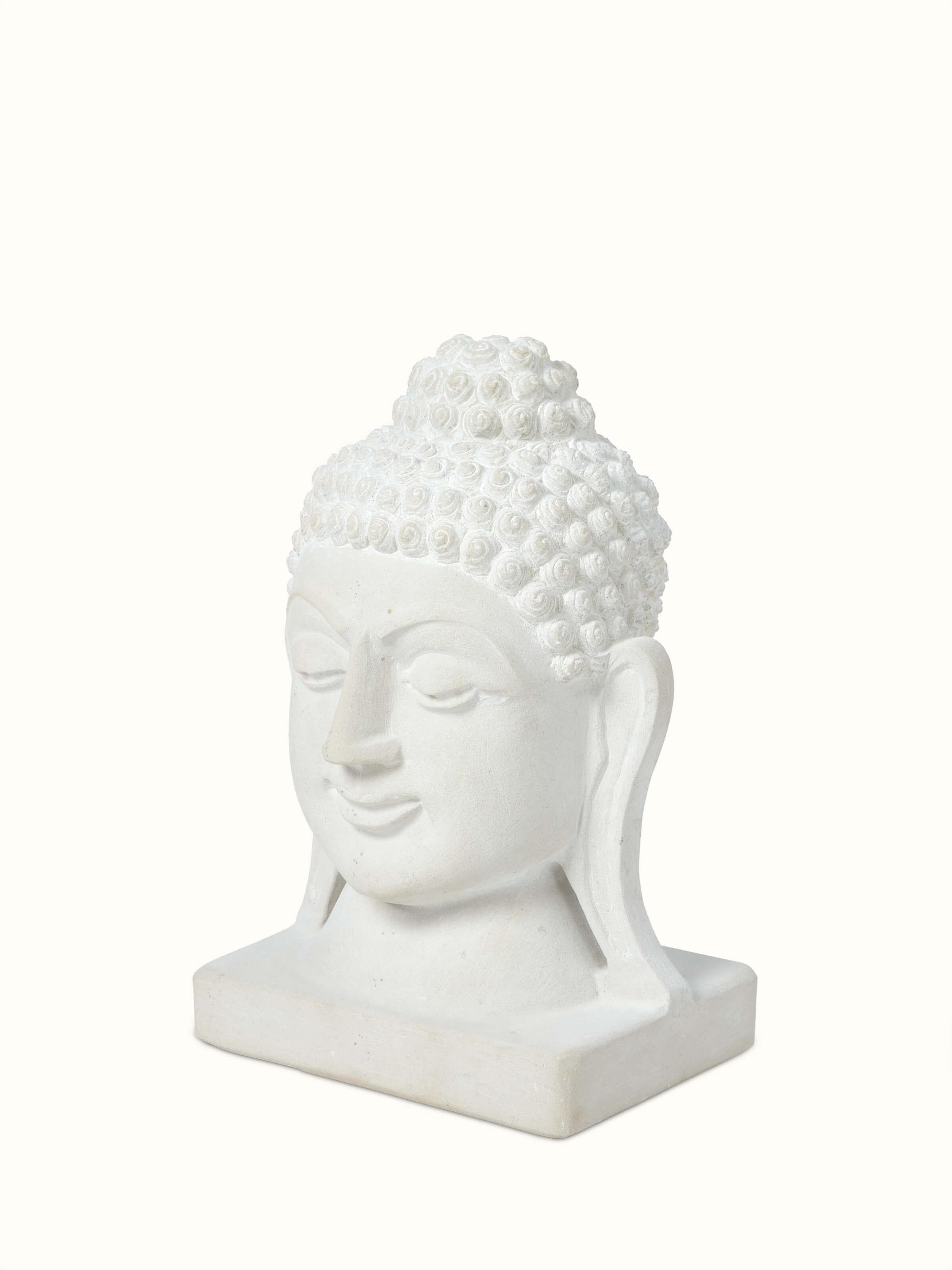 Side view of Tranquil Carved Stone Buddha Face Idol highlighting the carved details