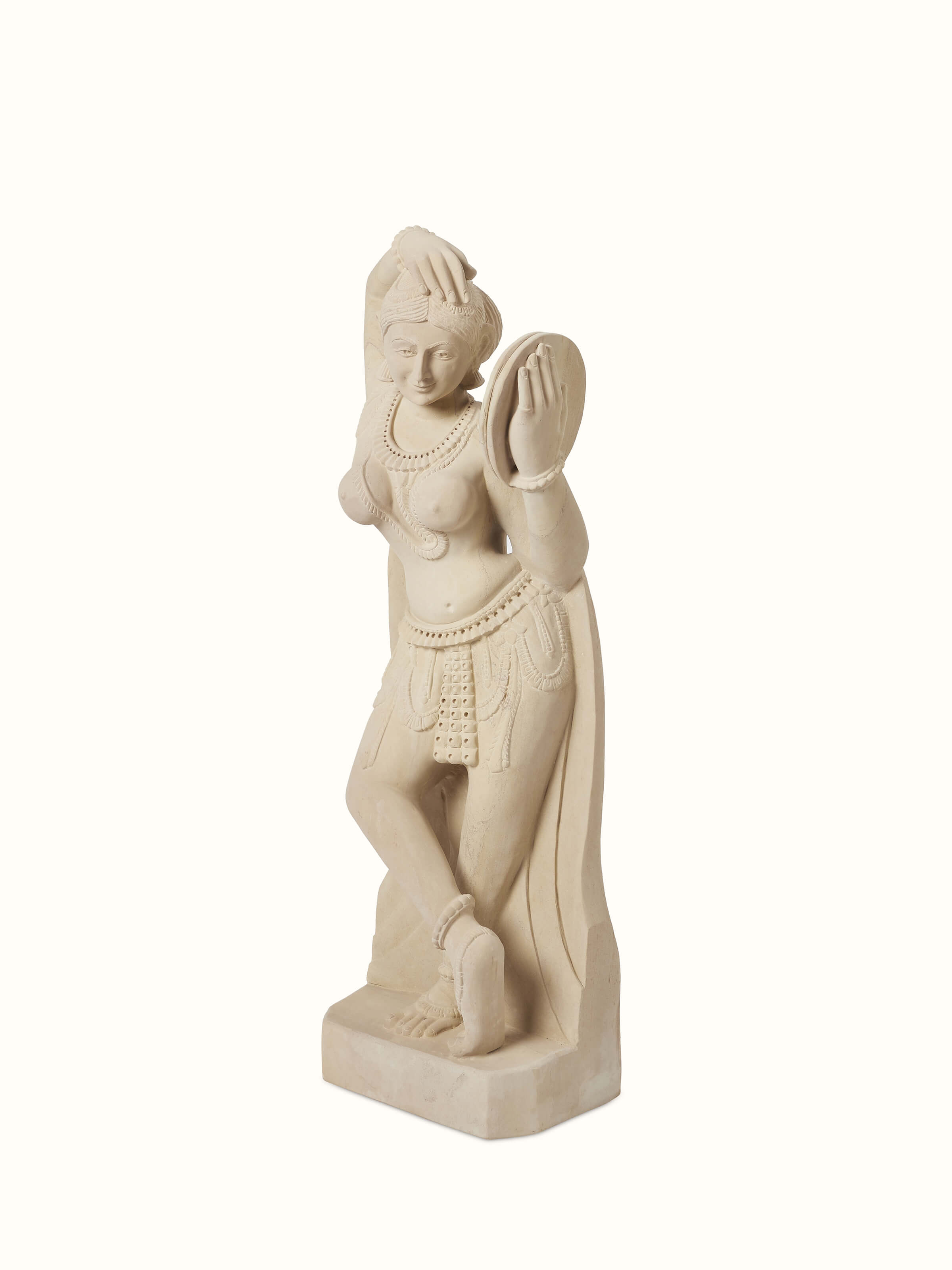 Angled view of the Gwalior carved stone Apsara sculpture with a mirror highlighting the fine craftsmanship.