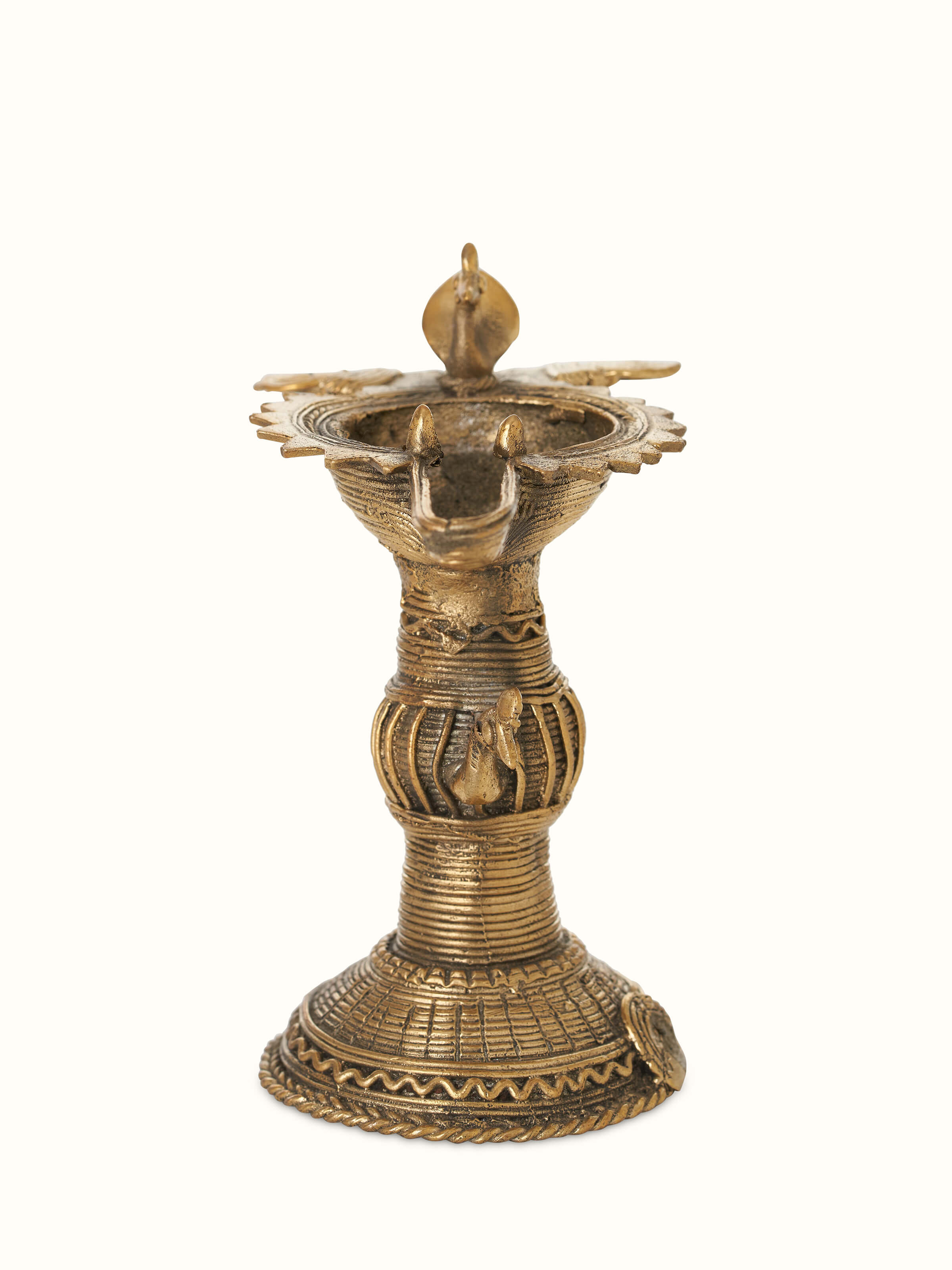 Front view of Antique brass dhokra diya highlighting its traditional design and ornate details
