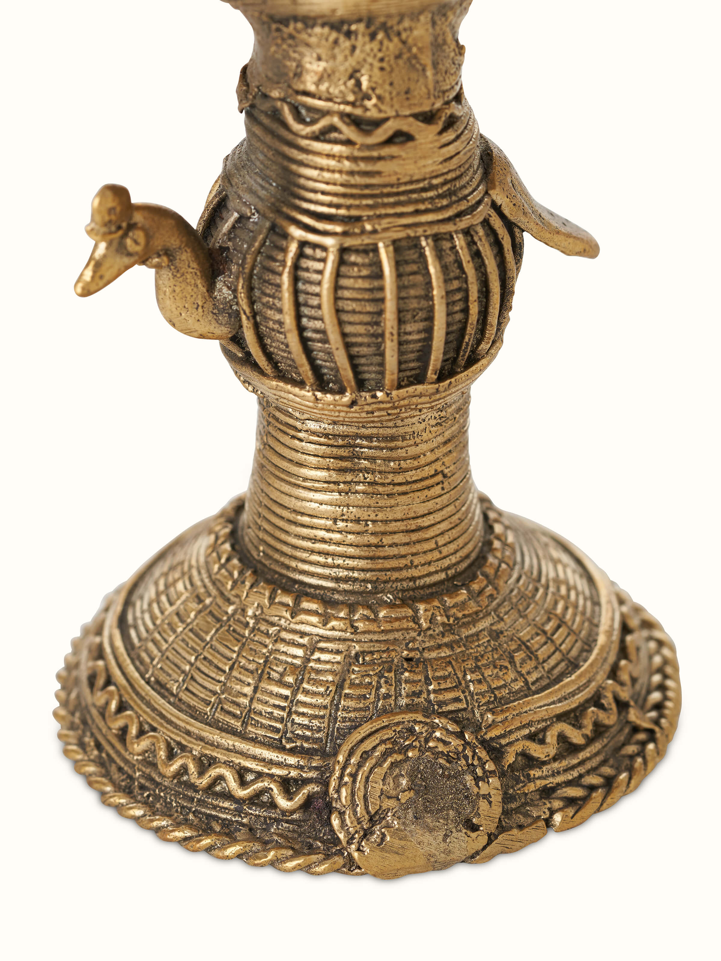 Top view of Antique brass dhokra diya revealing its unique design and ornamental features