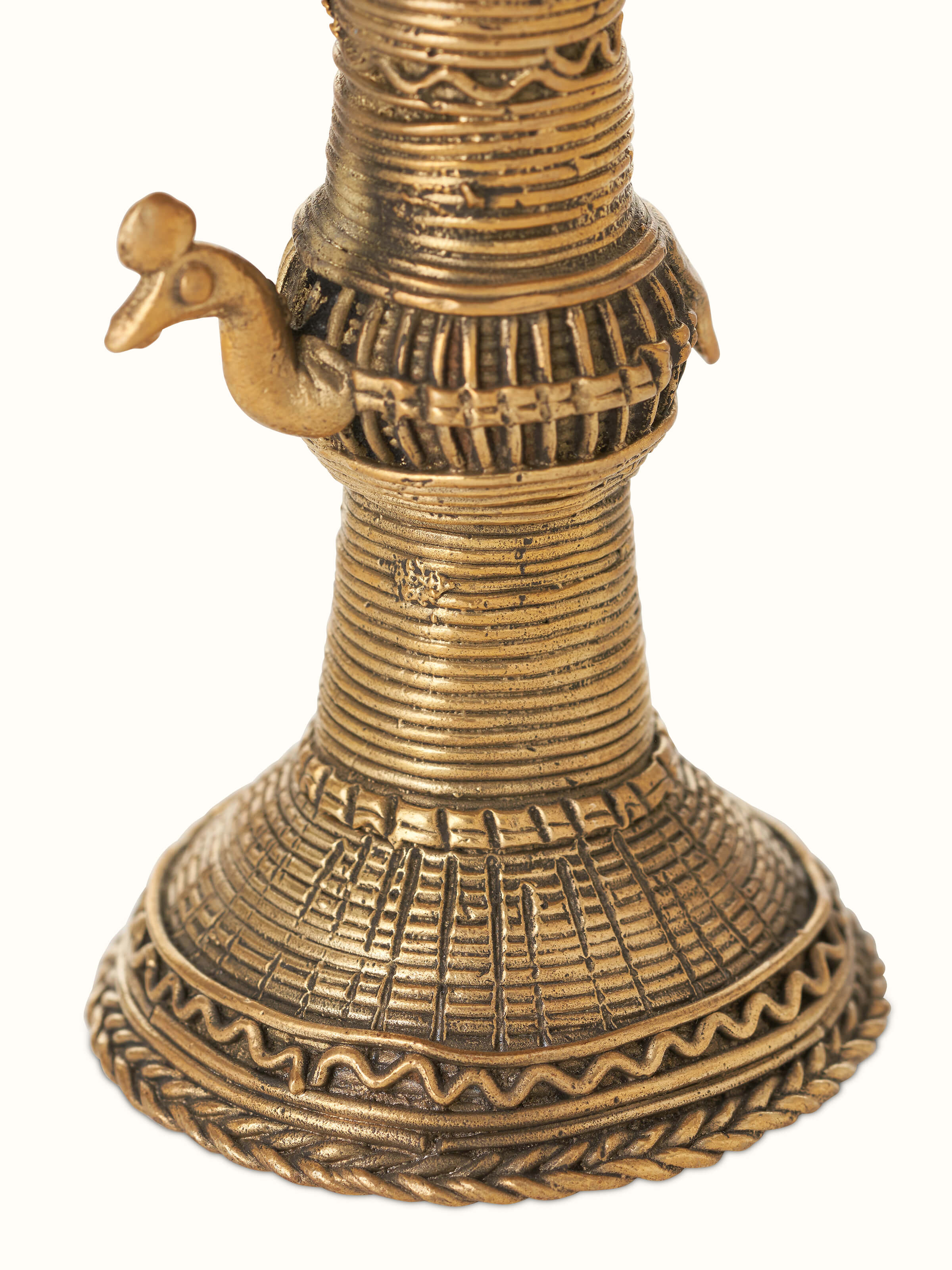 Artistic view of Traditional Antique Brass Dhokra Diya, emphasizing its elegant metalwork