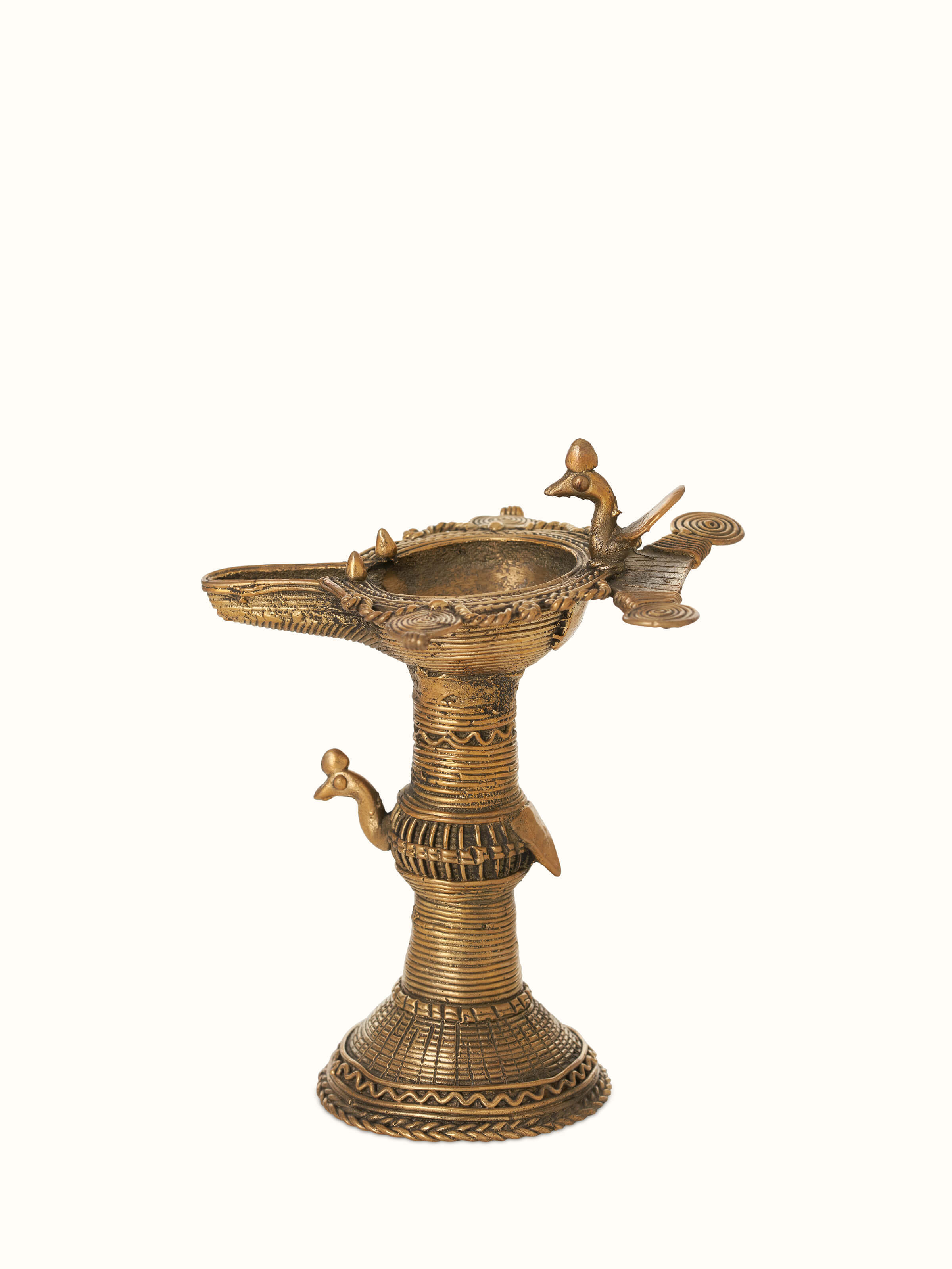 Close-up view of Traditional Antique Brass Dhokra Diya, showcasing detailed brasswork
