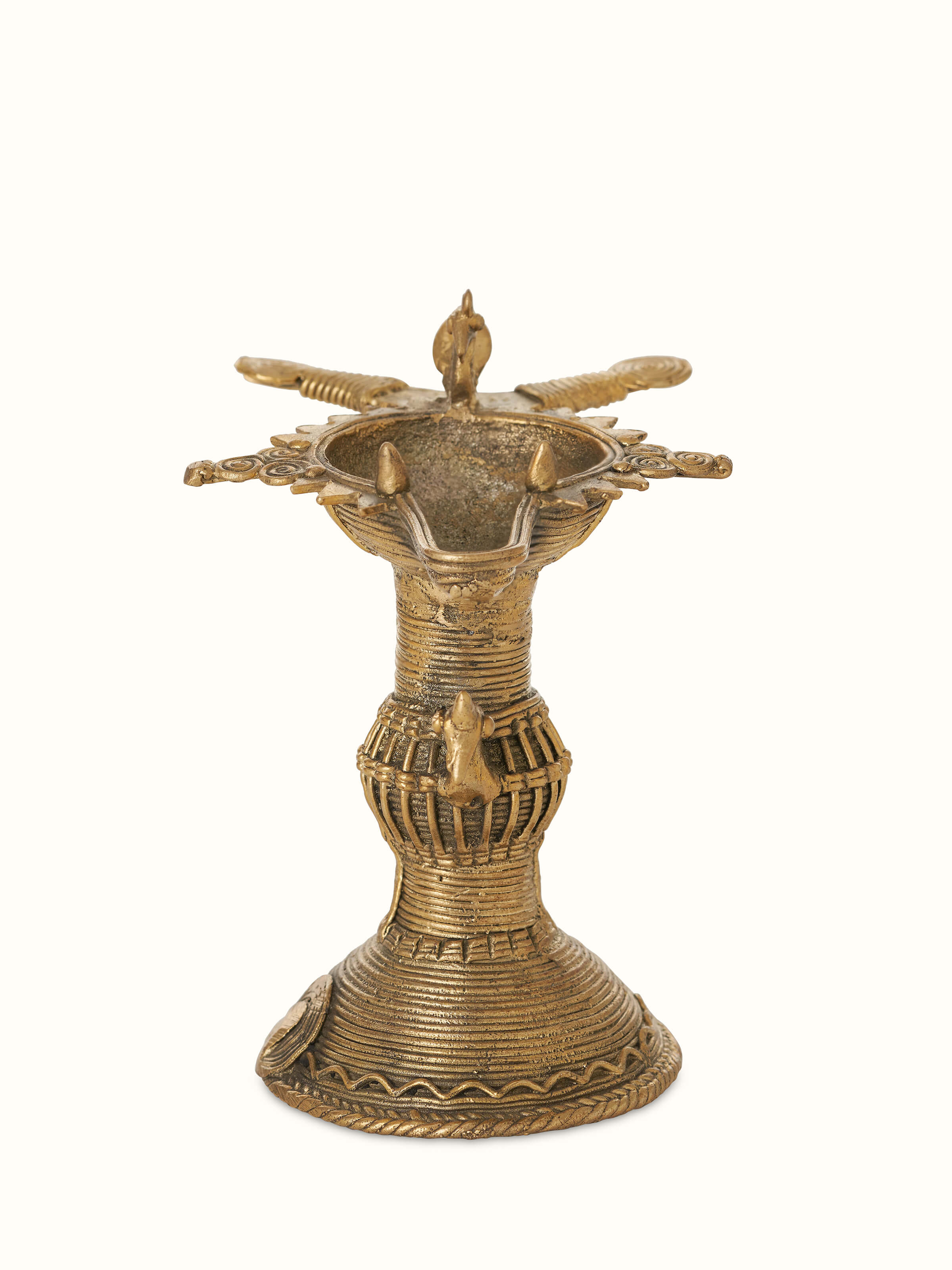 Front view of antique brass dhokra diya, showcasing its traditional design and intricate brass detailing
