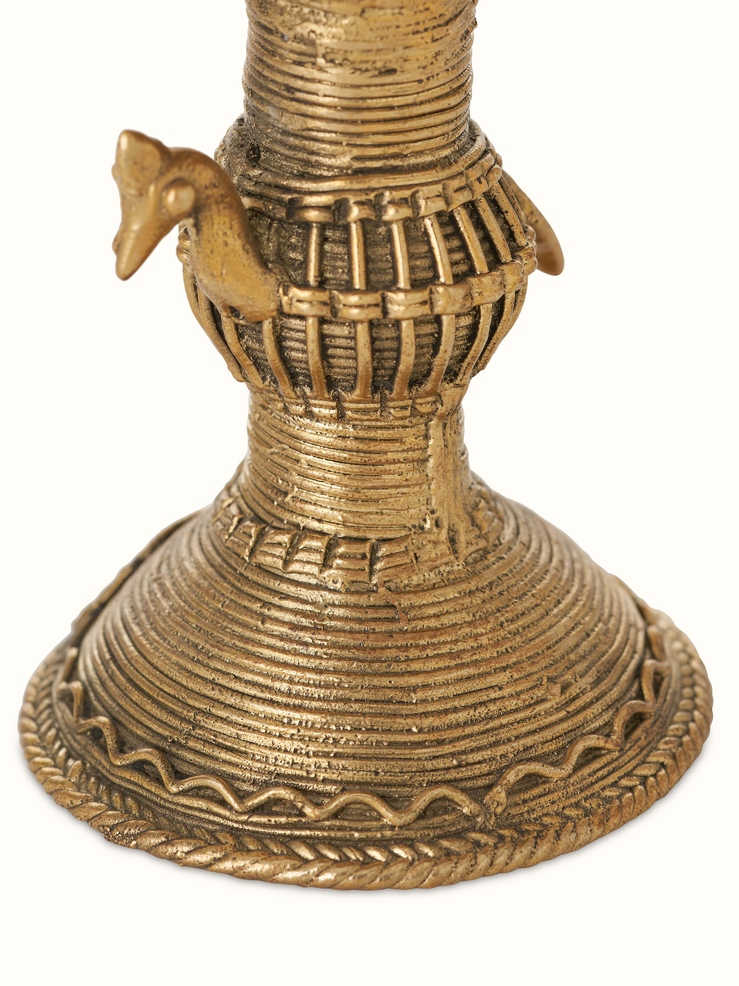 Detailed top view of antique brass dhokra diya, showcasing the craftsmanship and antique brass texture