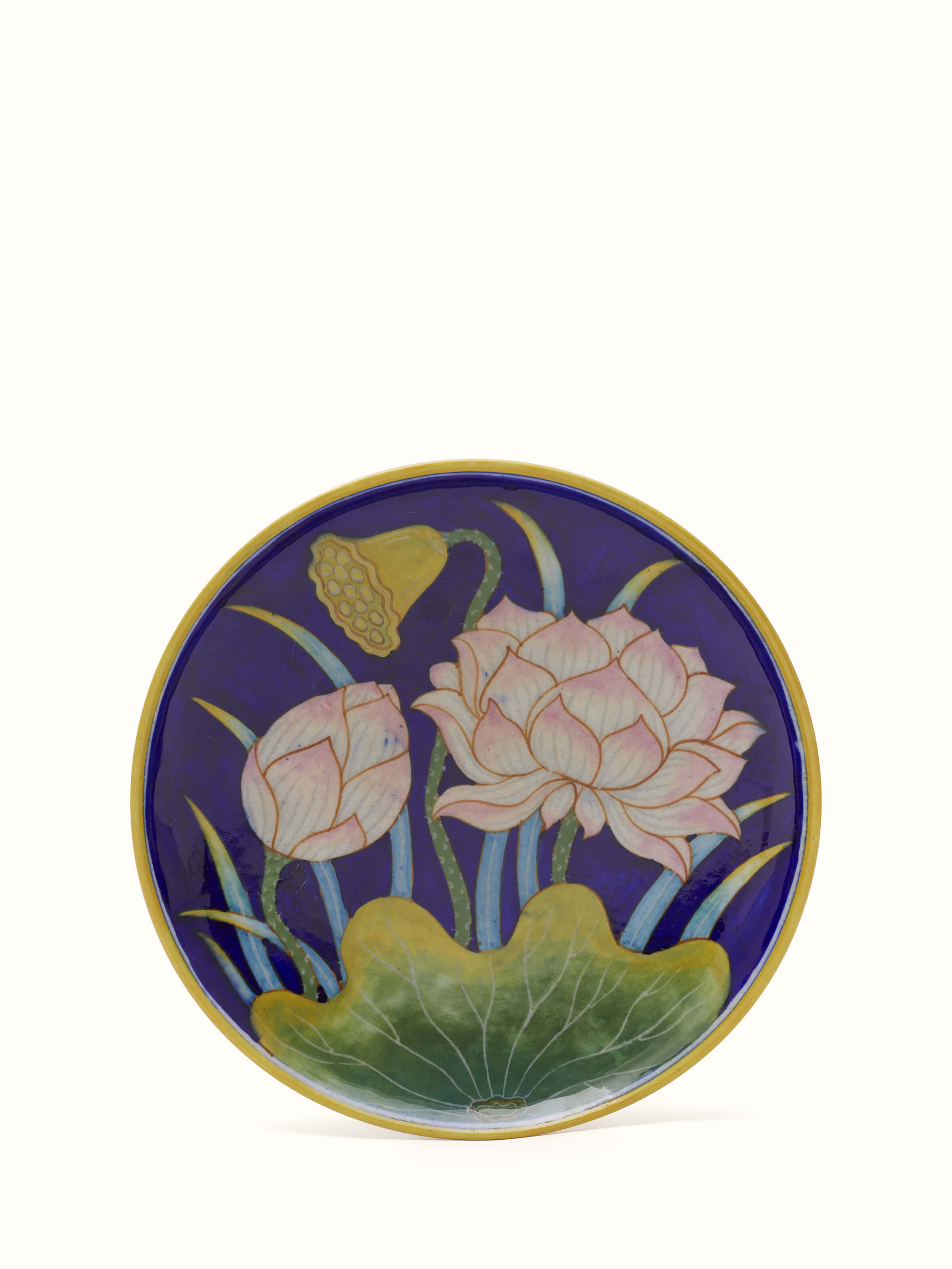 Front view of Blue Pottery flower with leaf display plate, showcasing vibrant blue and floral patterns