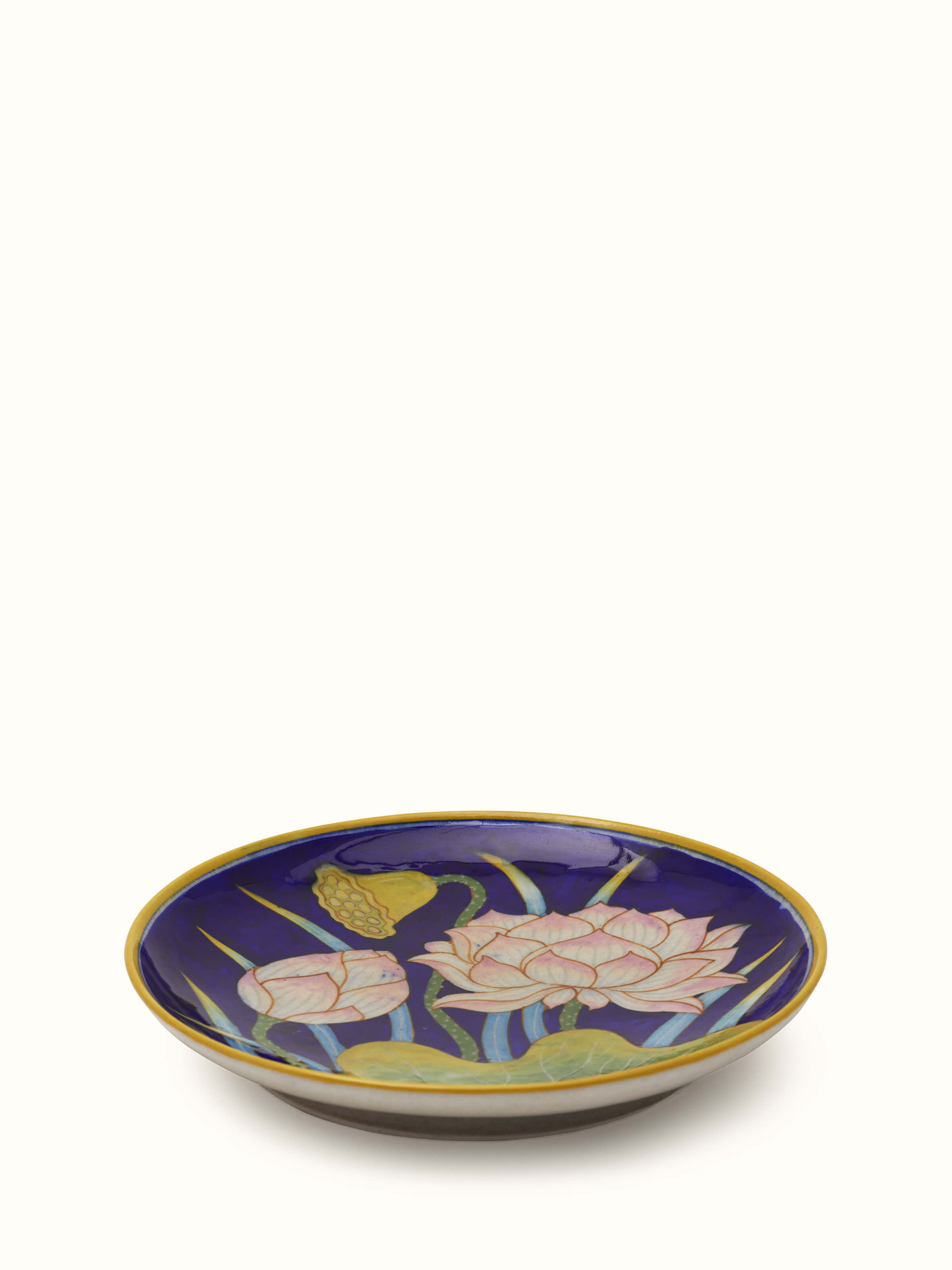 Angled view of Blue Pottery flower with leaf display plate emphasizing the detailed craftsmanship and design