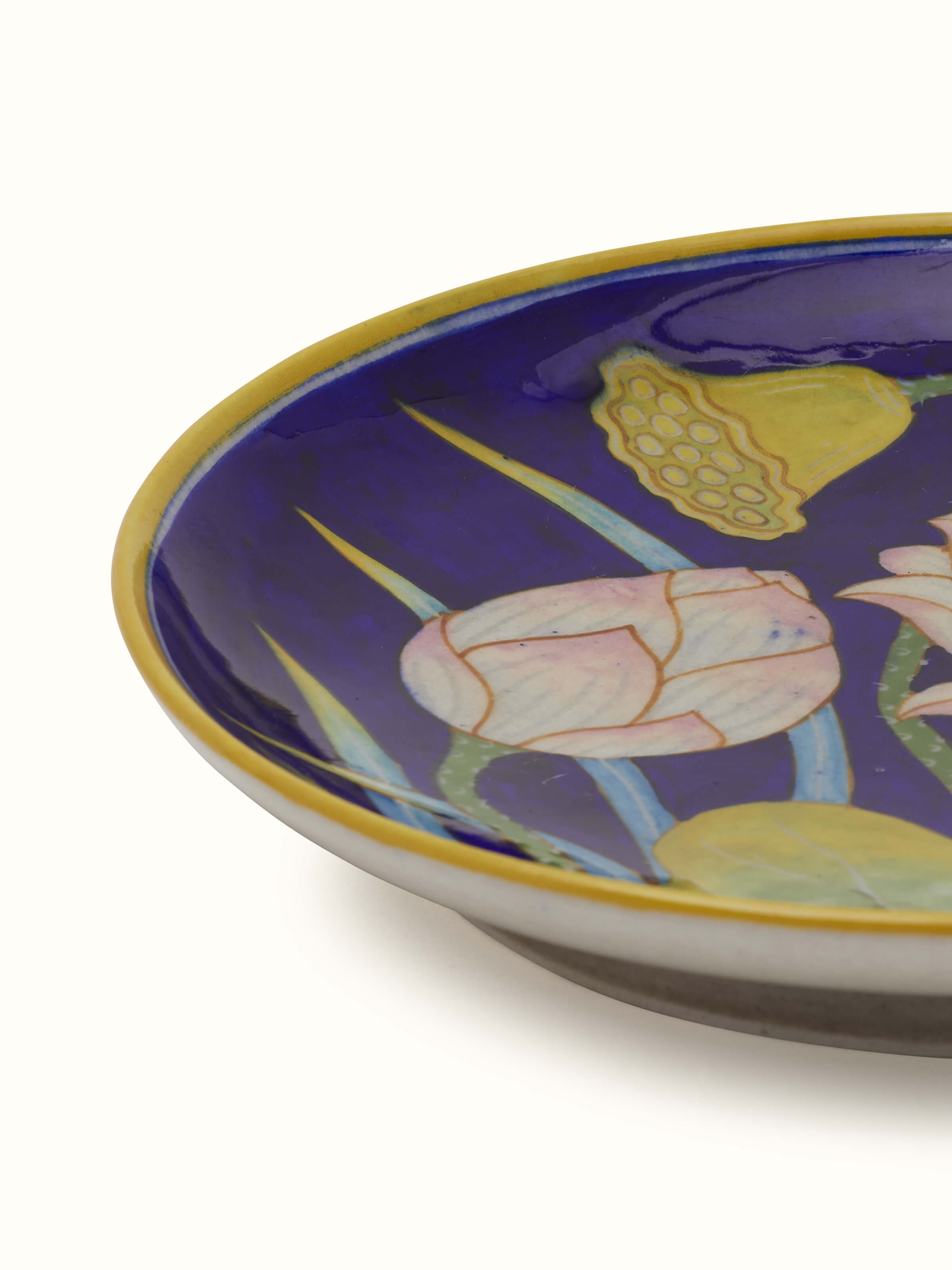 Close-up of Blue Pottery flower with leaf display plate focusing on the beautiful blue glaze and intricate patterns