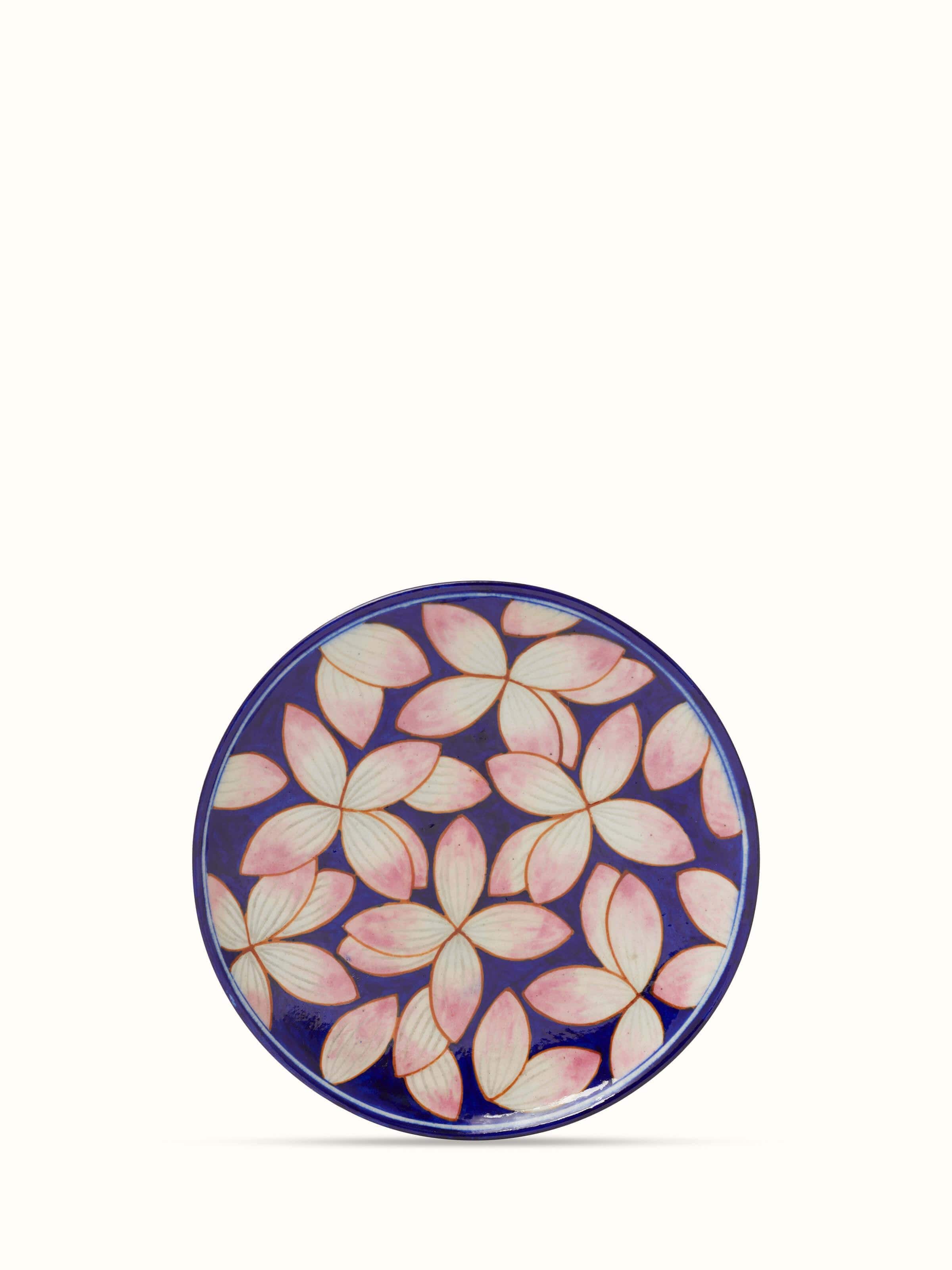 Side view of Blue Pottery Contemporary Flower Display Plate showcasing the smooth glaze and vibrant floral design