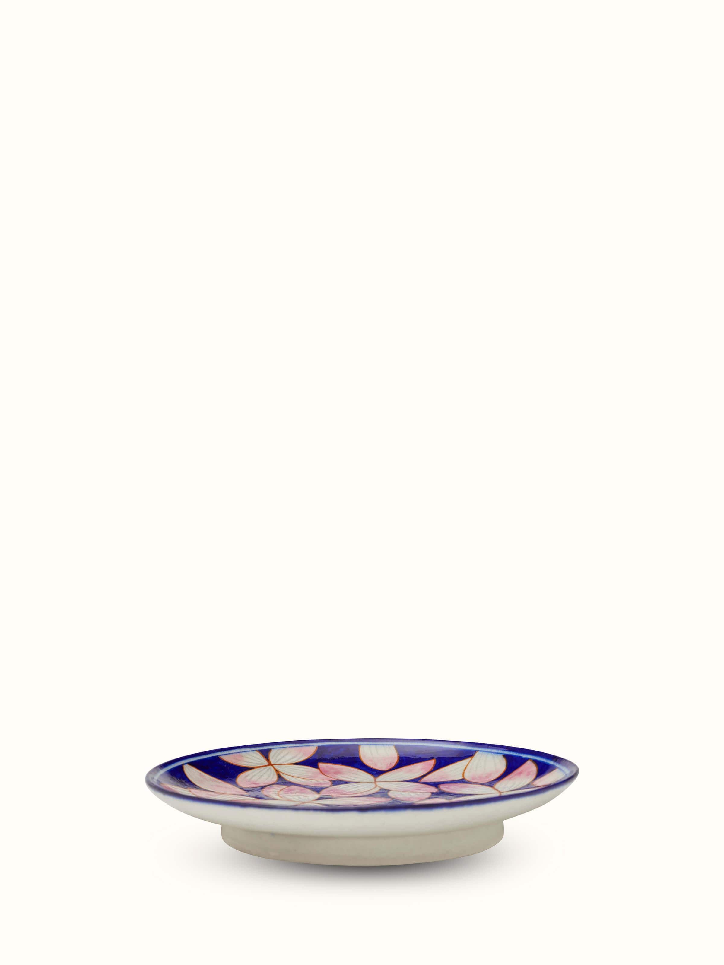 Detailed view of Blue Pottery Contemporary Flower Display Plate focusing on the artistic floral design and polished finish