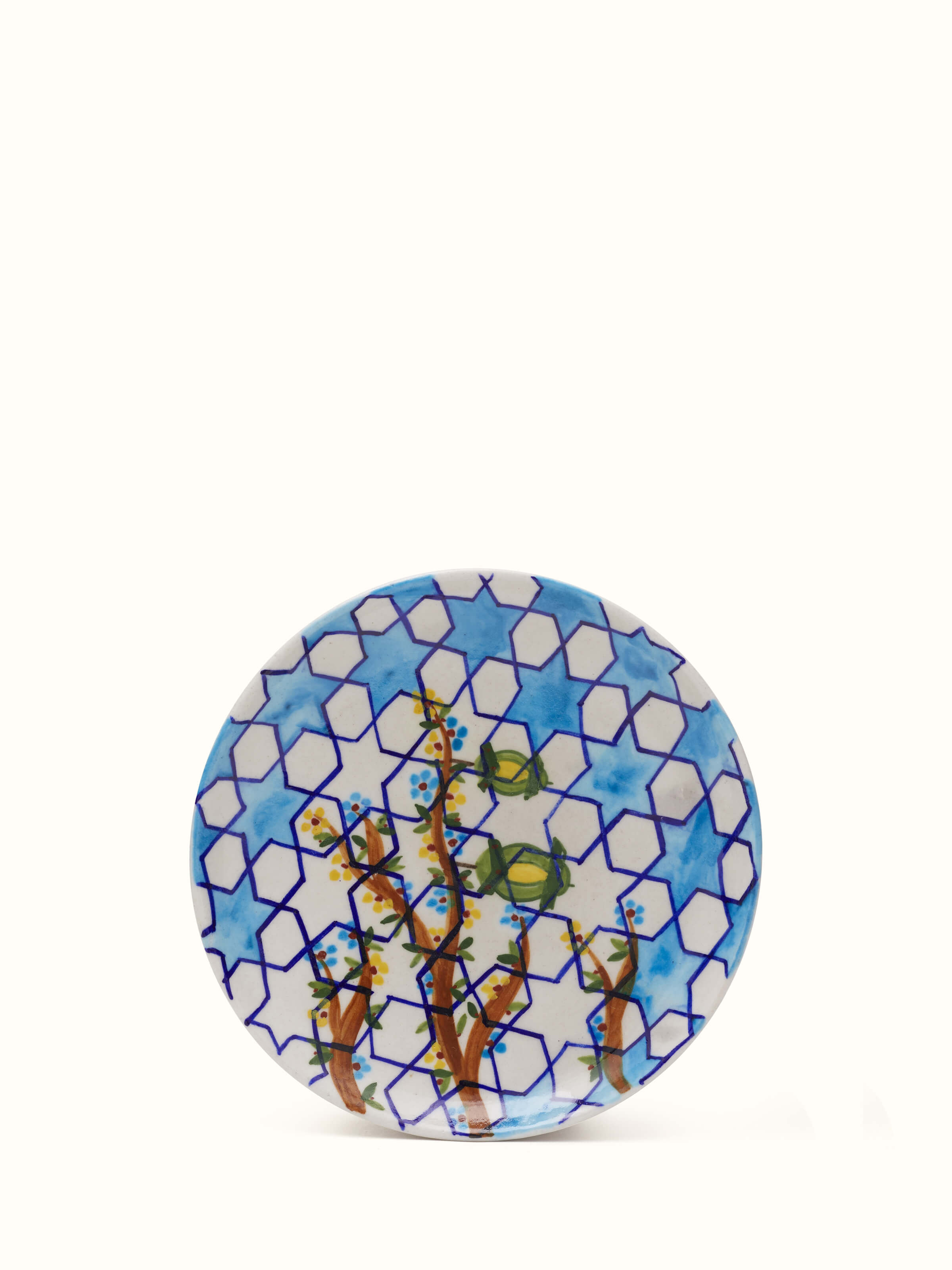 Front view of Blue Pottery Hexagonal Pattern Display Plate by Swadesh showcasing vibrant colors and unique hexagonal pottery design.