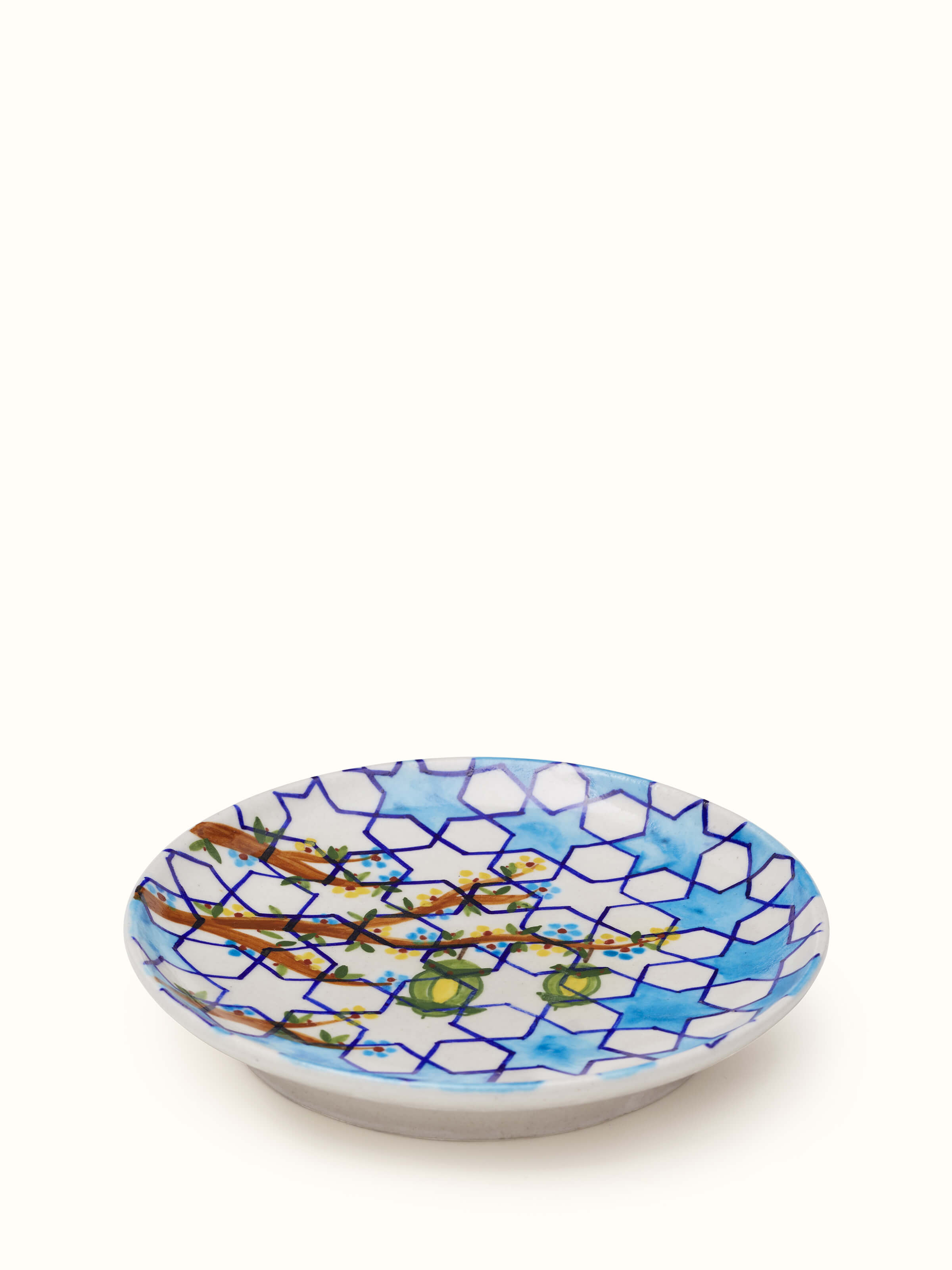 Overhead view of Blue Pottery Hexagonal Pattern Display Plate by Swadesh displaying the unique hexagonal pattern and intricate pottery.