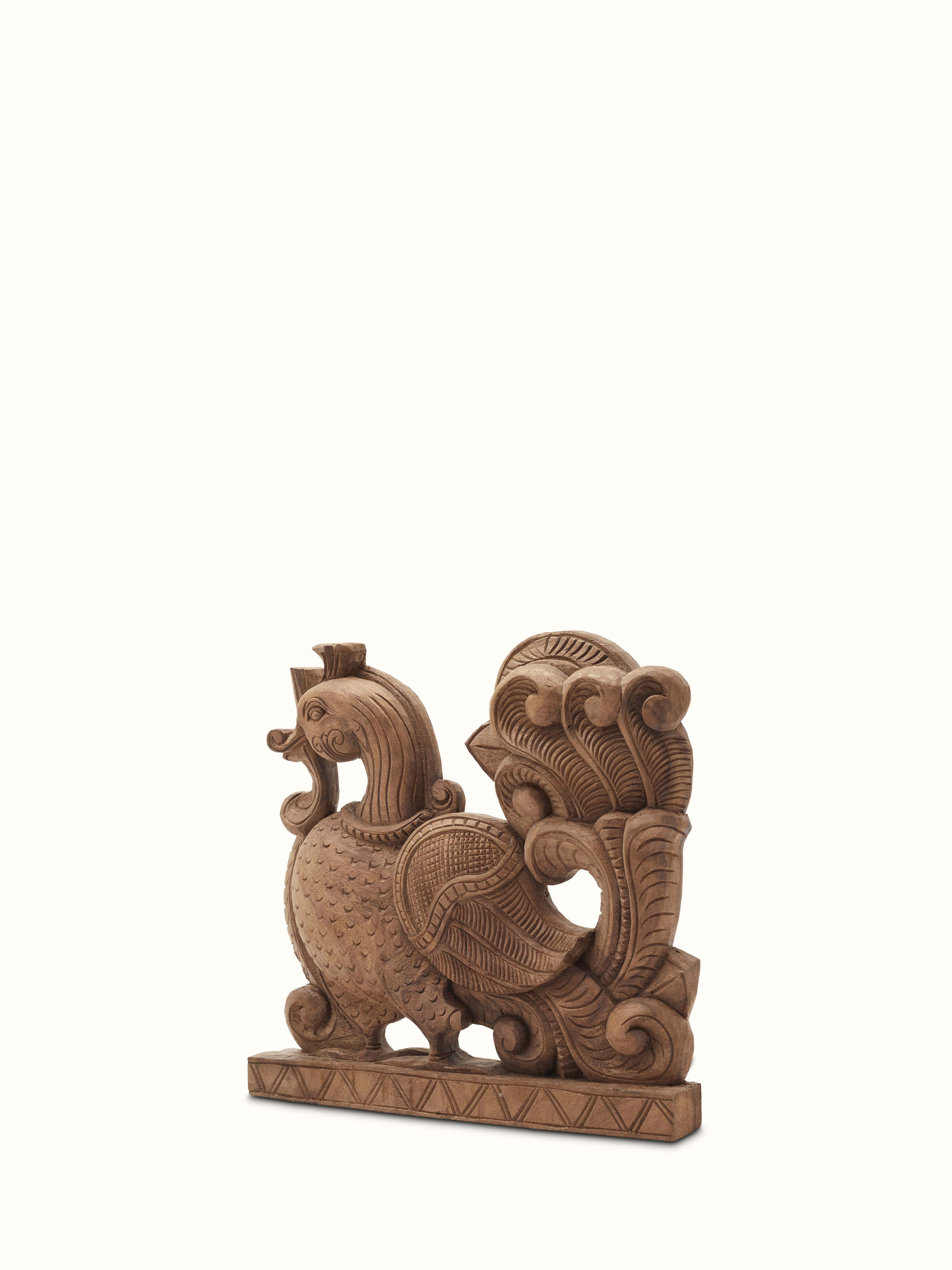 Detailed view of carved neem wood parrot brackets sculpture highlighting its traditional design.