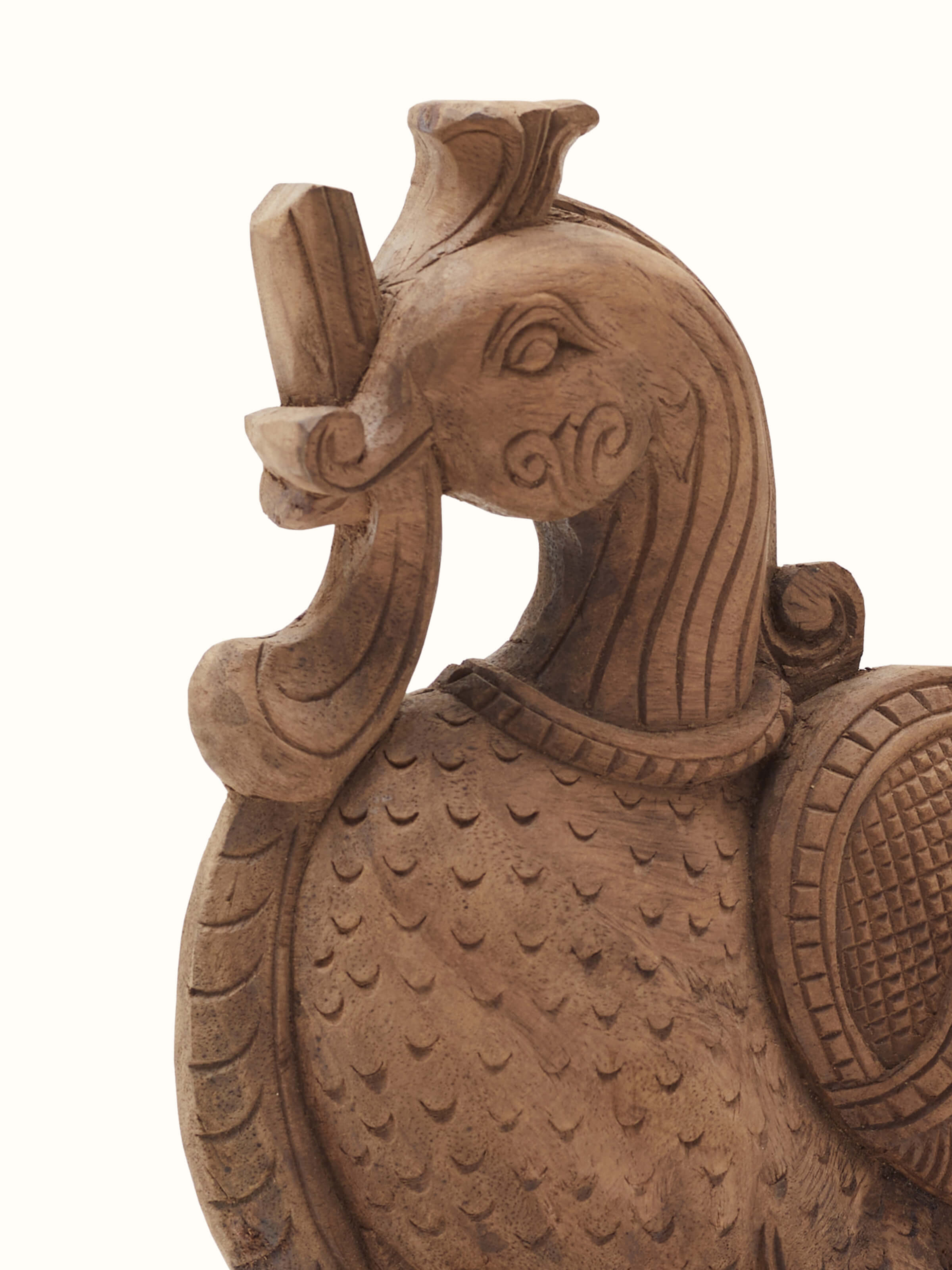 Carved neem wood parrot brackets sculpture with a focus on intricate details and vibrant colors.