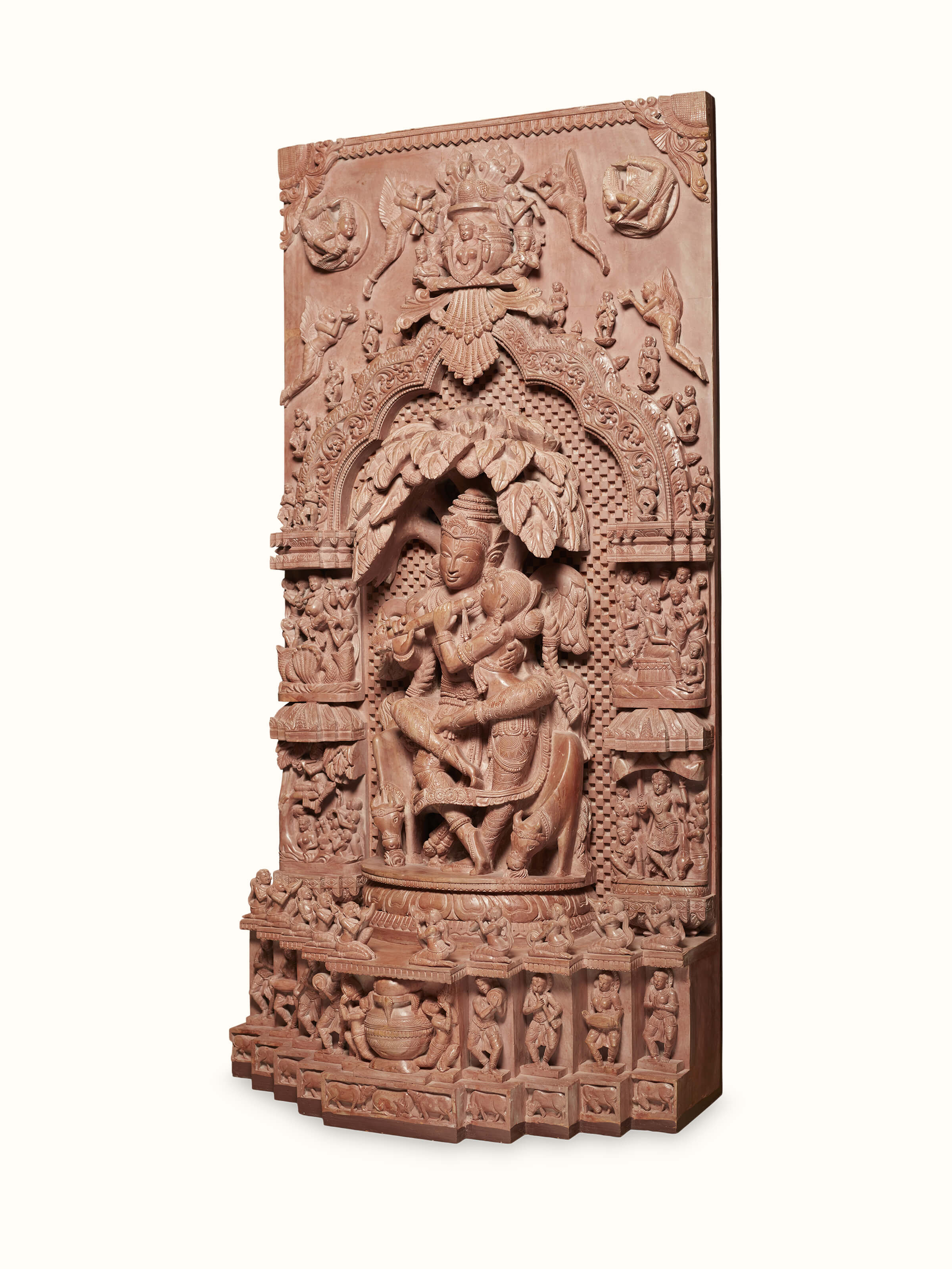 Side view of Carved Stone Dancing Radha & Krishna Idol showcasing the details of the carving.