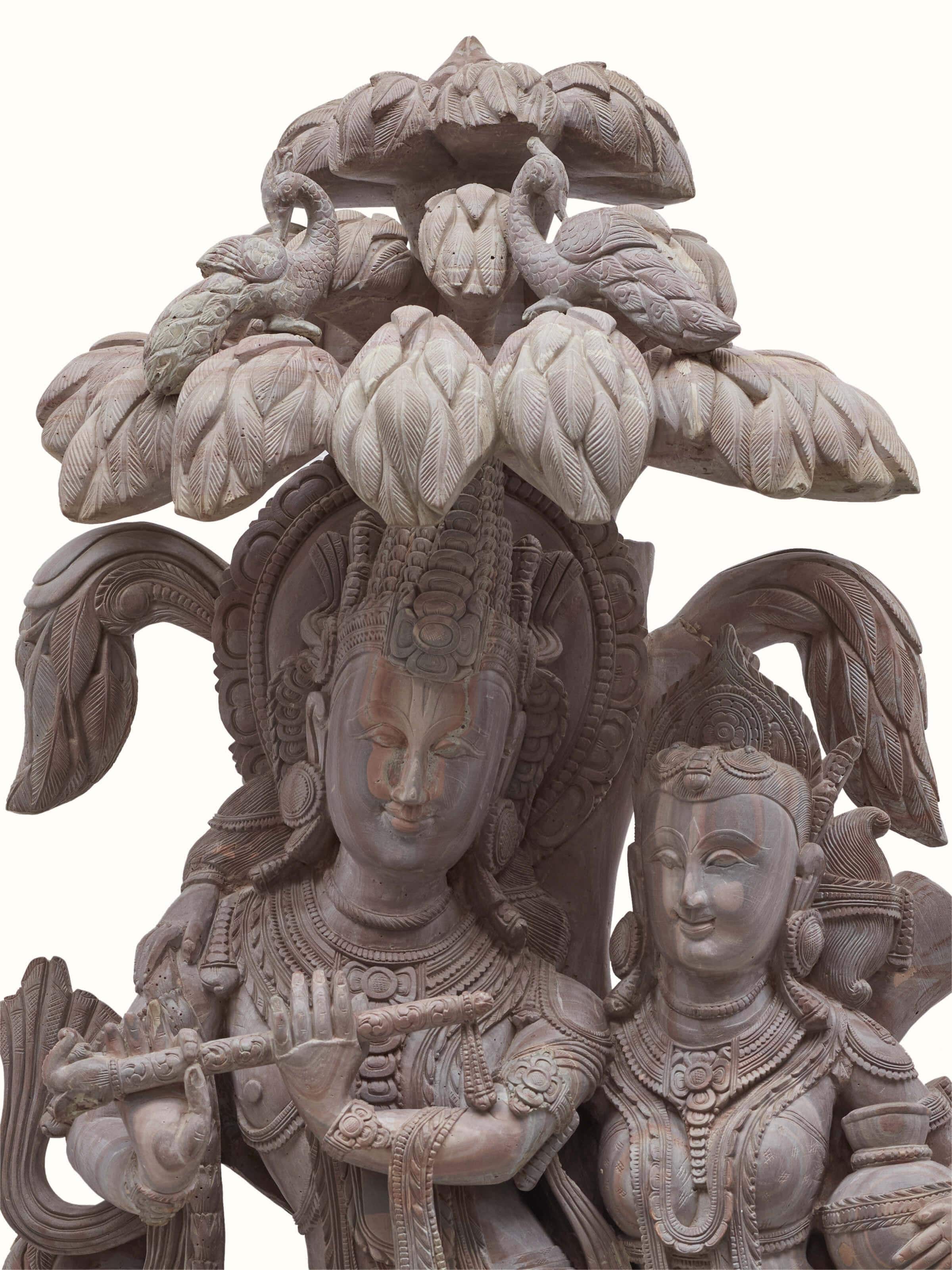 Close-up of Carved Stone Radha & Krishna's Romance Idol showcasing fine details
