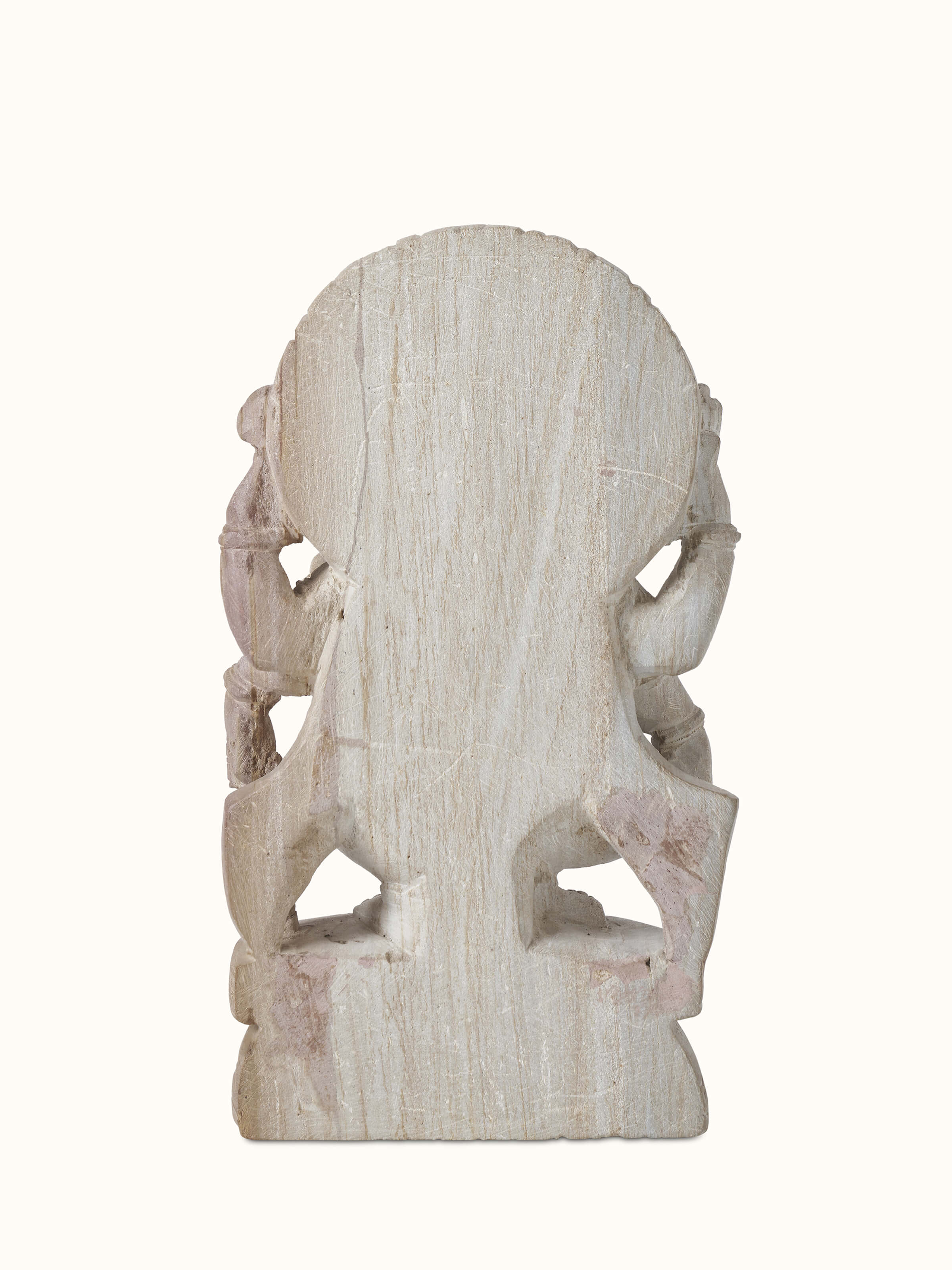 Side view of Divine Carved Stone Ganapathi Idol focusing on its divine details and artistic design