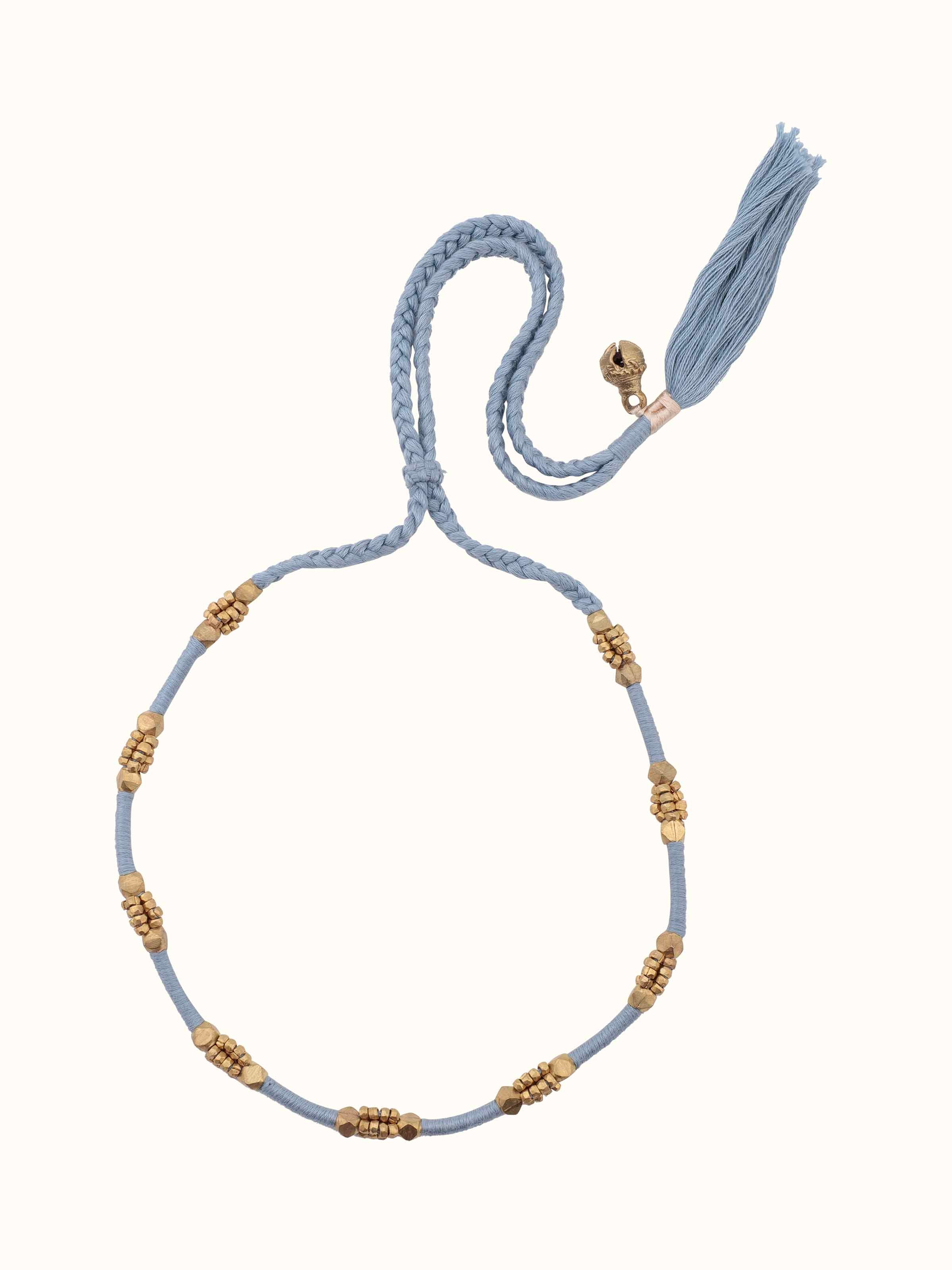 Side view of Dhokra choker set (2 pcs) highlighting the elegant design and detailed metalwork of the chokers.