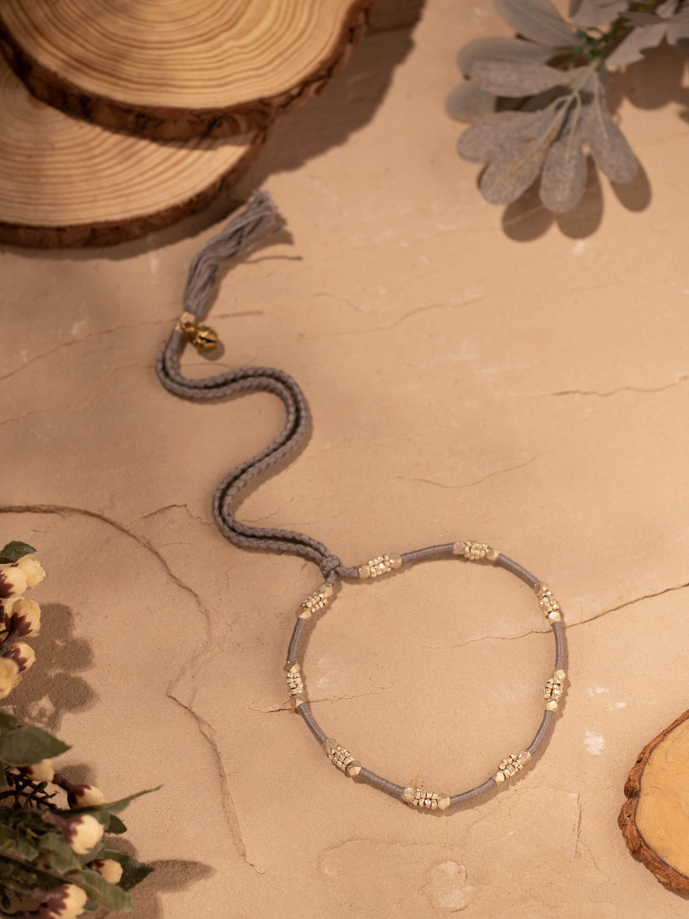 Close-up of Dhokra choker set (2 pcs) focusing on the traditional patterns and fine craftsmanship of each piece.