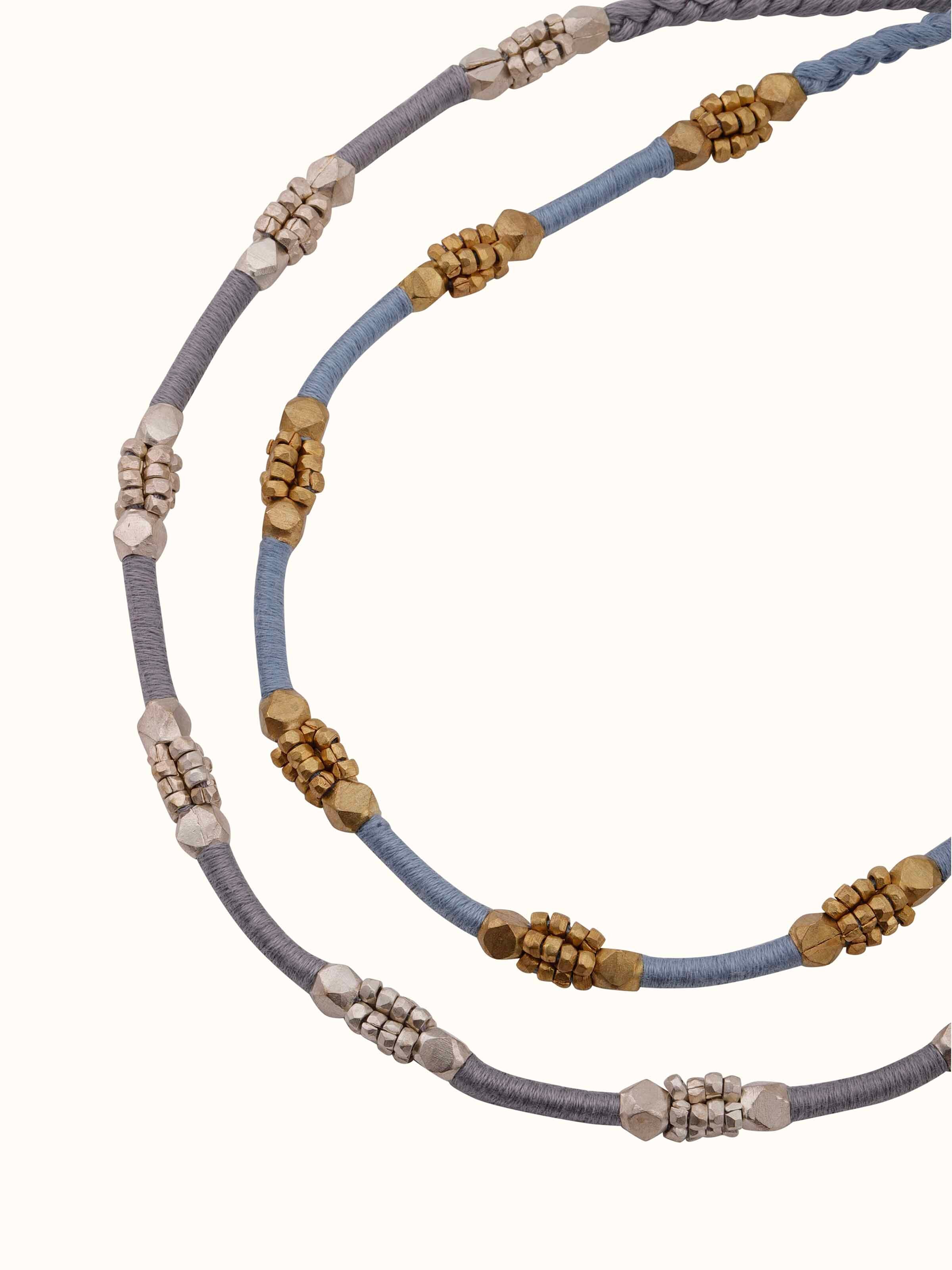 Dhokra choker set (2 pcs) highlighting the elegant design and traditional metalwork of each piece.