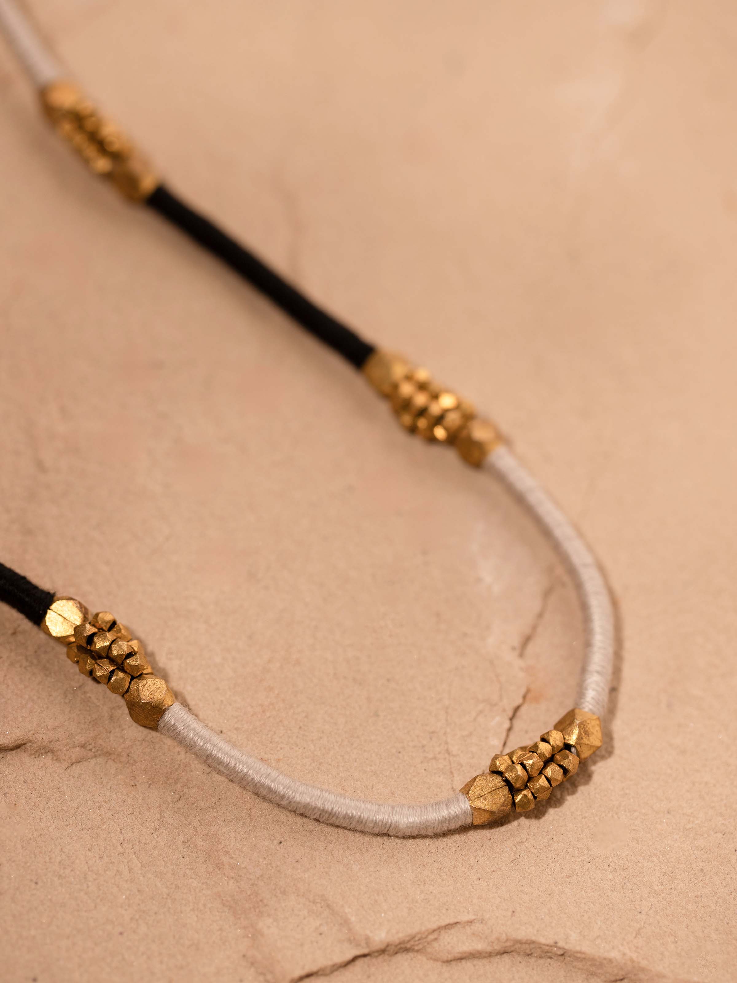 Overhead view of Dhokra Long Necklace showcasing the traditional Dhokra metalwork and elegant long design.