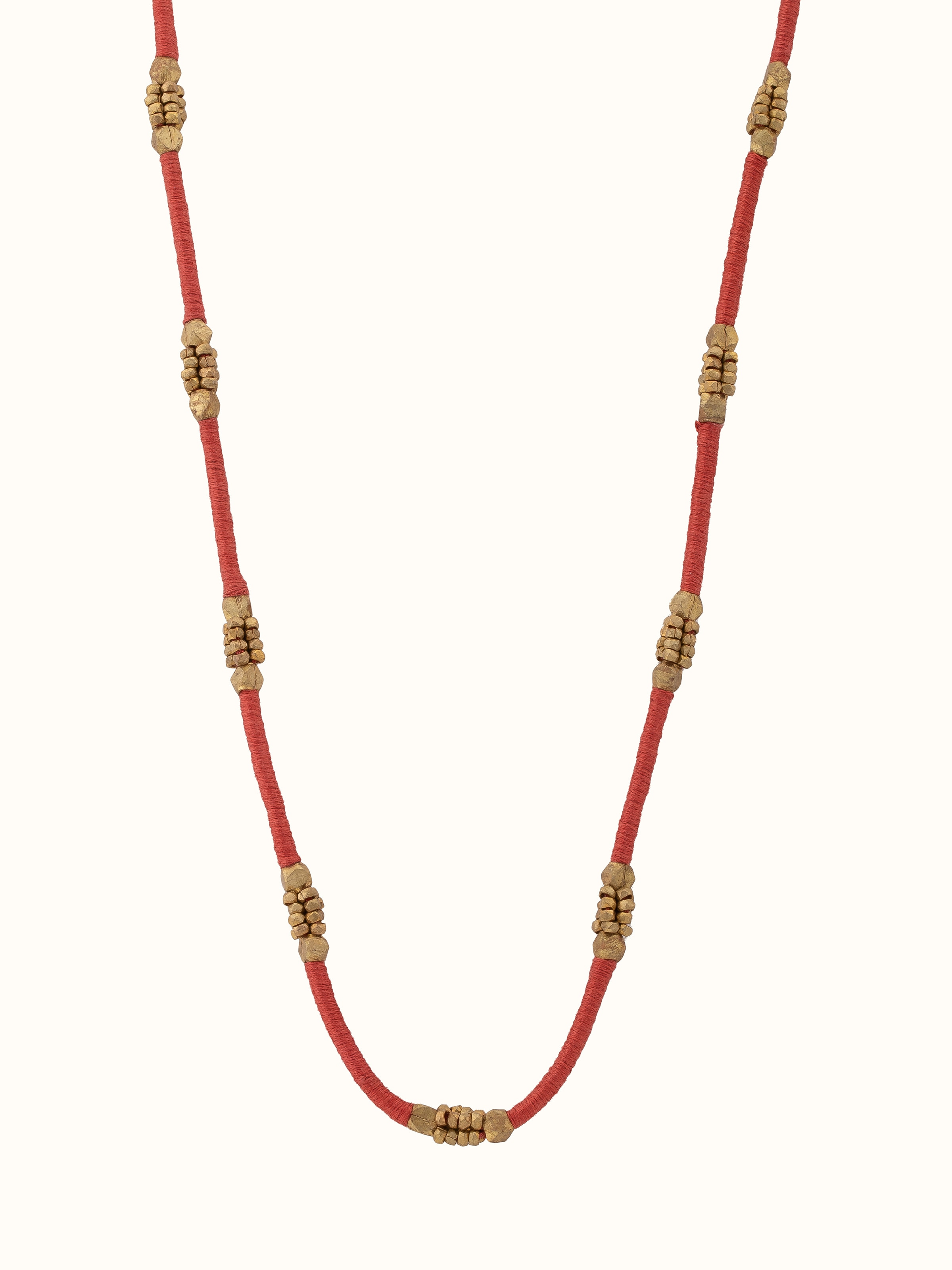 Front view of Dhokra long necklace featuring traditional tribal designs and handcrafted elements
