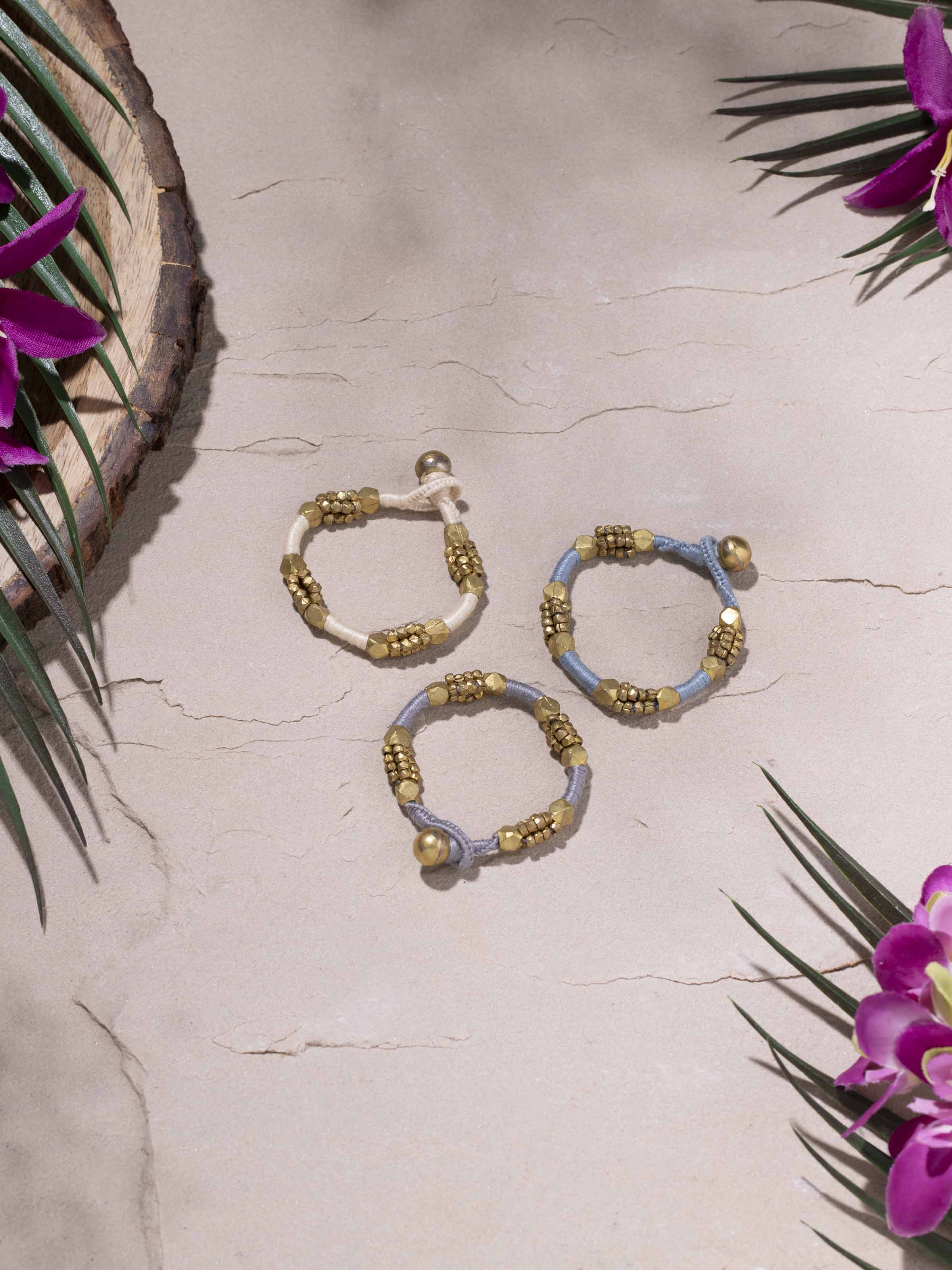 Side view of Dhokra bracelet set highlighting intricate patterns and craftsmanship.