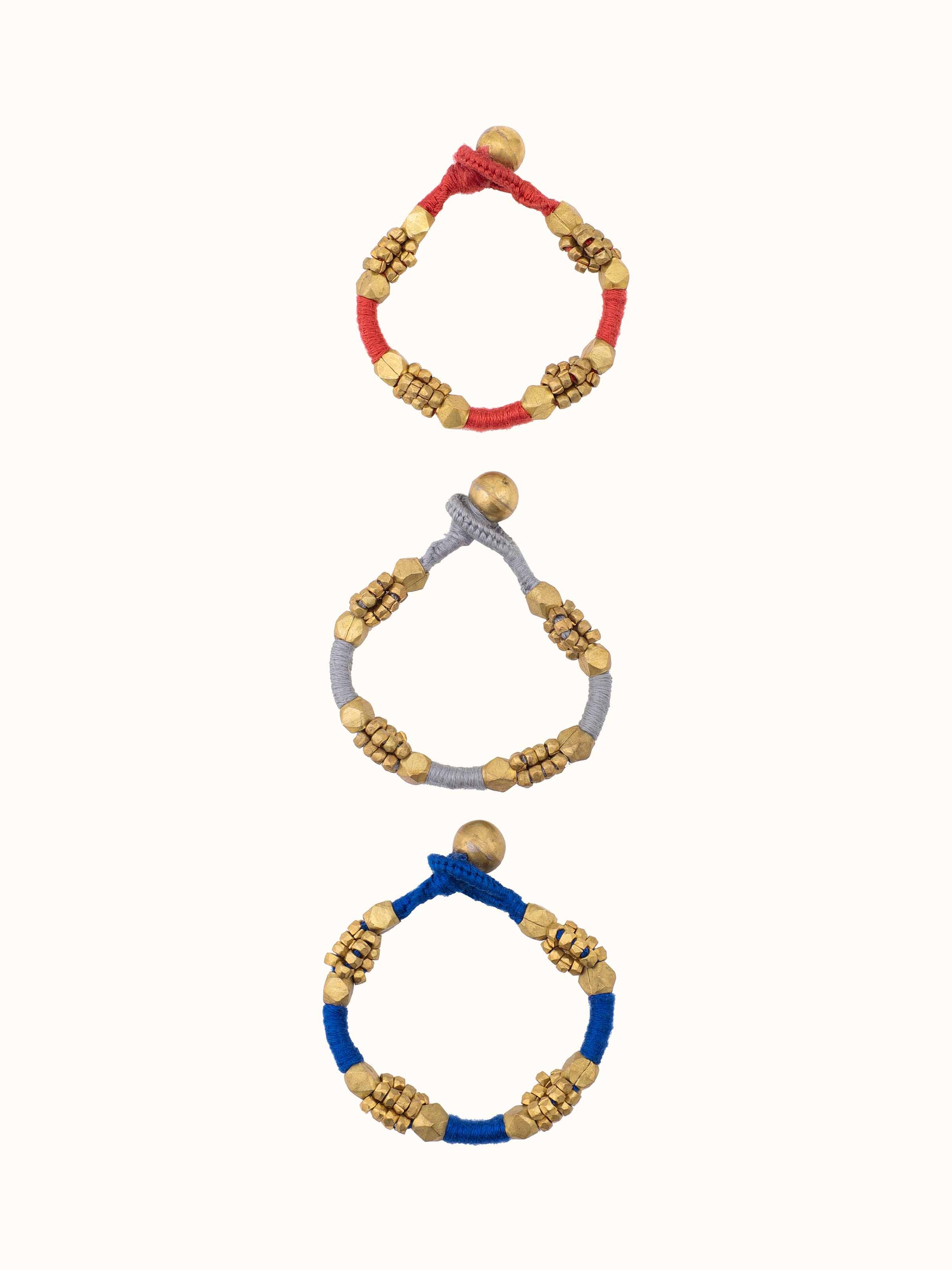 Front view of Dhokra Bracelet Set (3 pcs) highlighting traditional metalwork and detailed designs