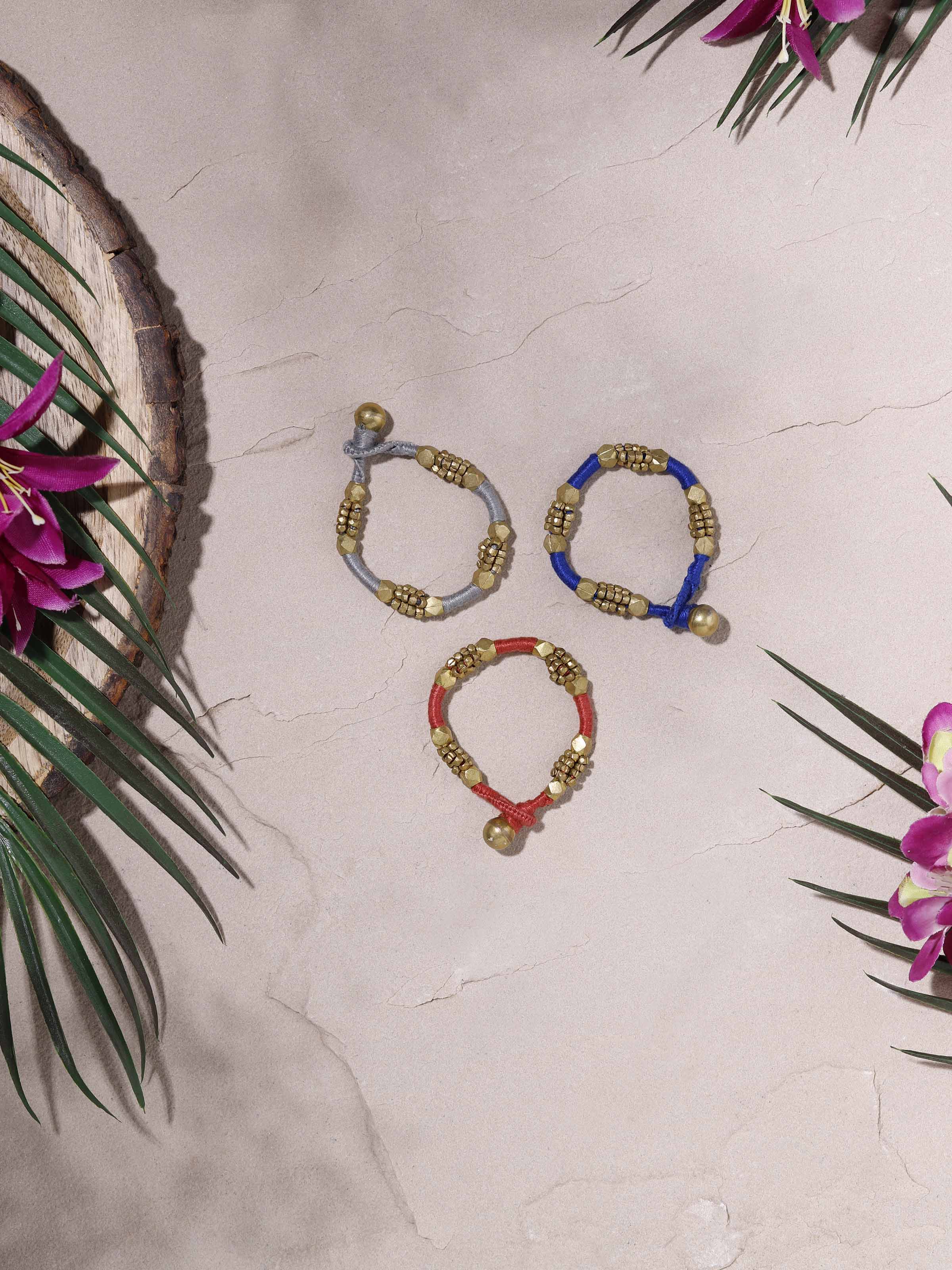 Close-up view of Dhokra Bracelet Set (3 pcs) showcasing detailed engravings and artistic design