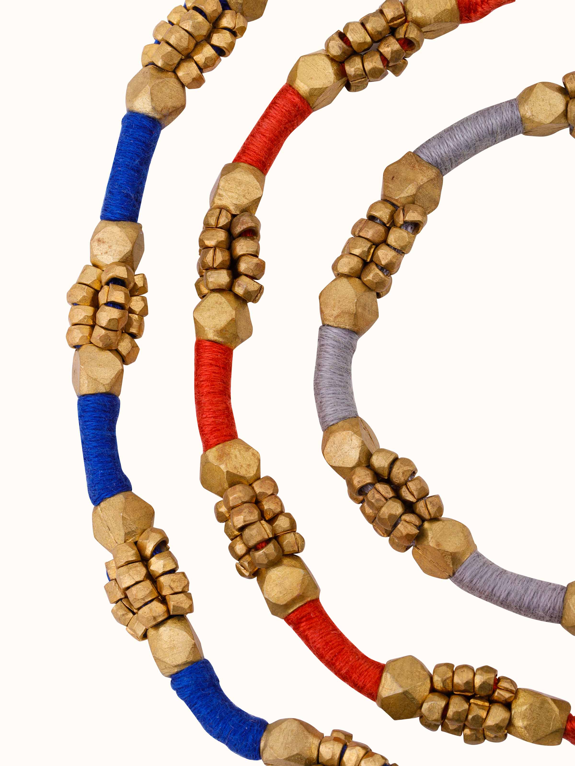 Overhead view of Dhokra Bracelet Set (3 pcs) emphasizing the traditional patterns and elegant finish