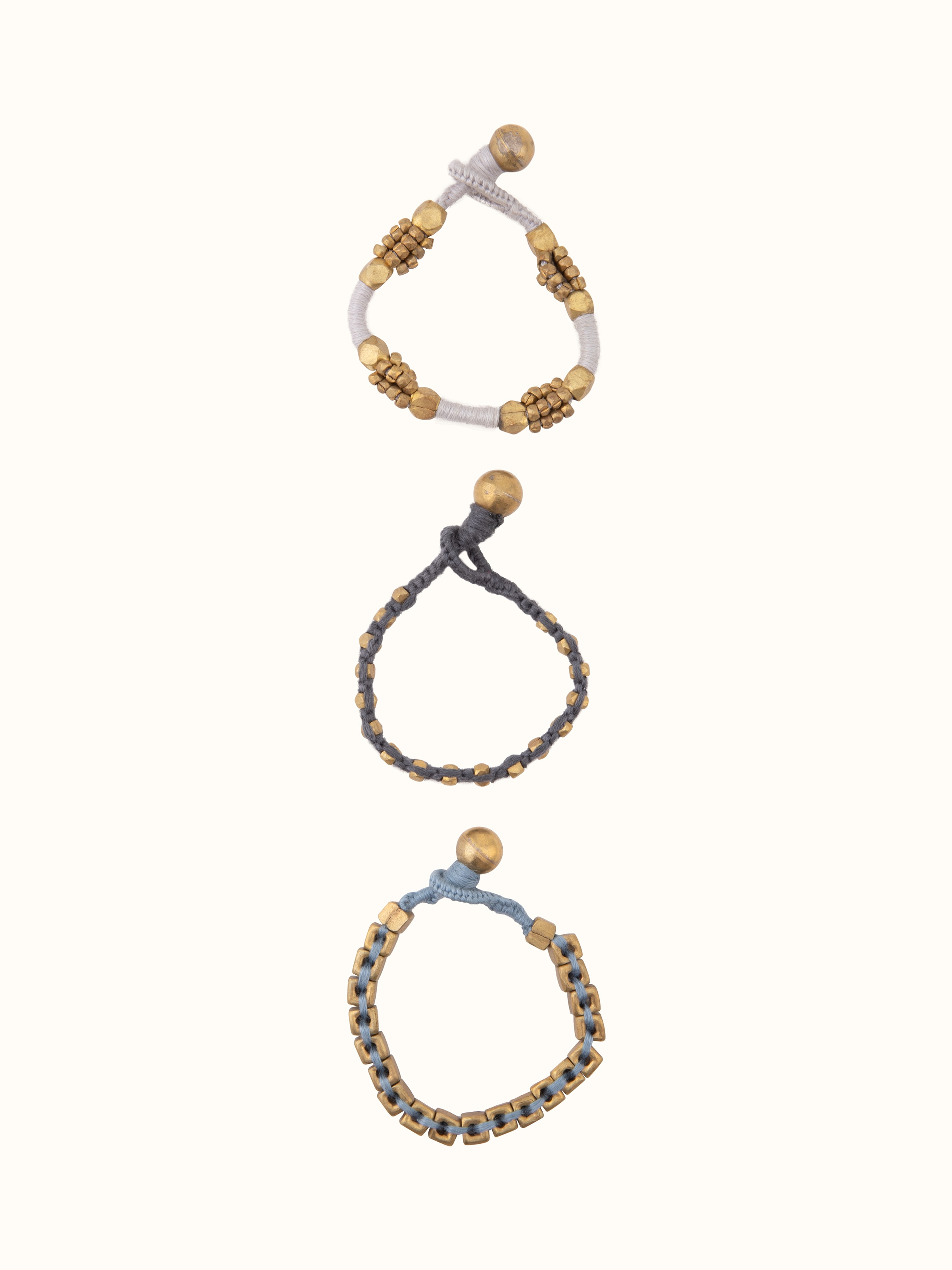 Front view of Silver Smithing drop earrings with detailed silverwork and design.