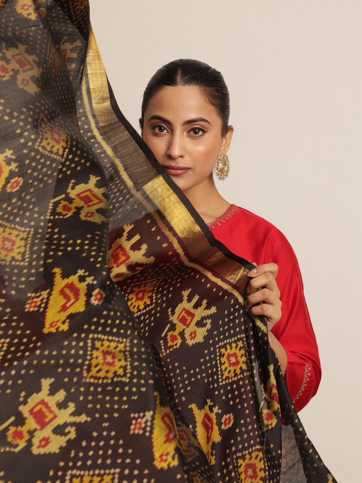 Alternate lifestyle view highlighting drape and sheen of the silk fabric.