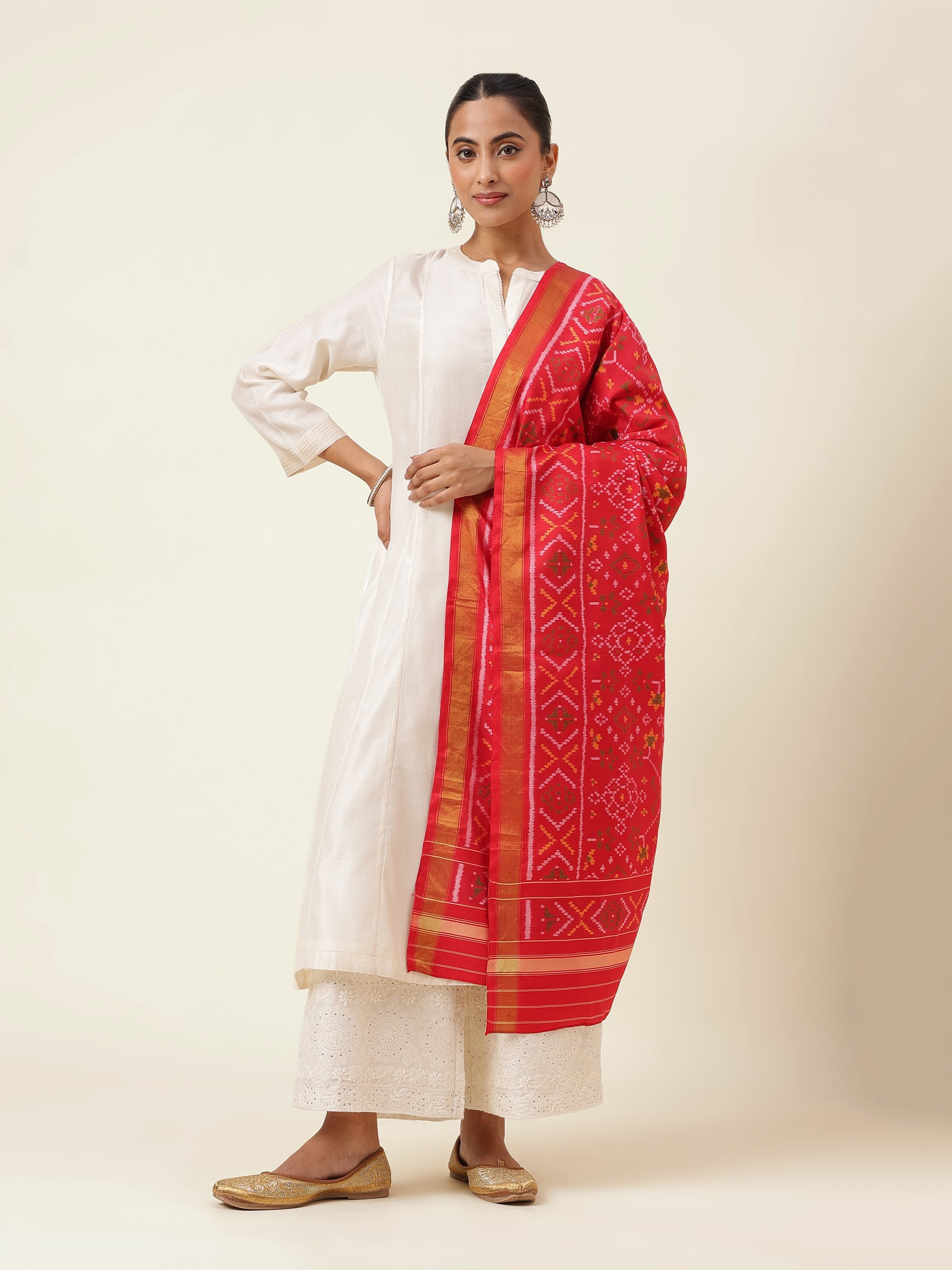 Alternate front view of red silk dupatta displaying symmetrical Ikat weave in vivid red and white