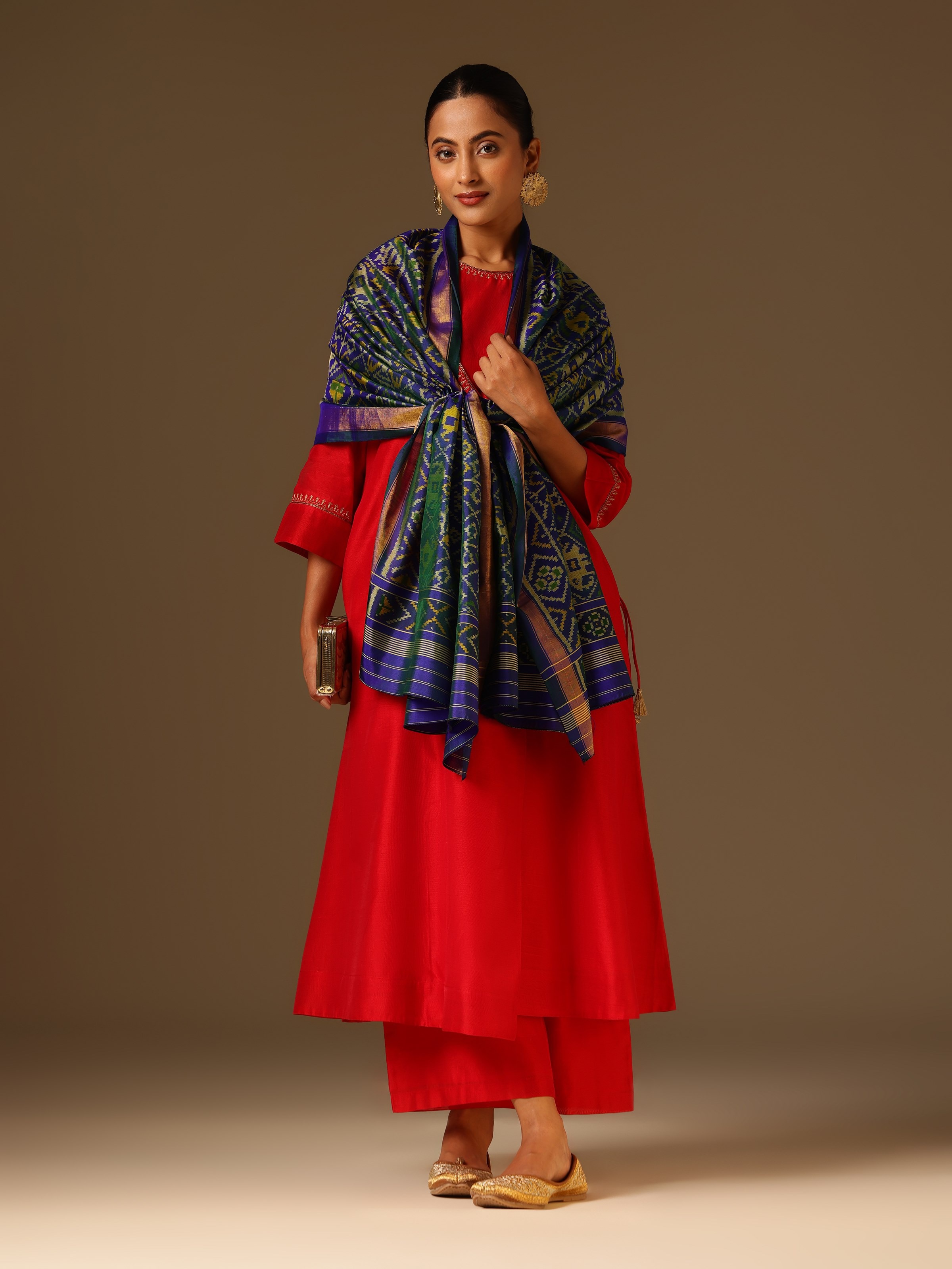 Lifestyle view of Blue Silk Ikat Dupatta draped elegantly showing flowing silk texture and ikat design.