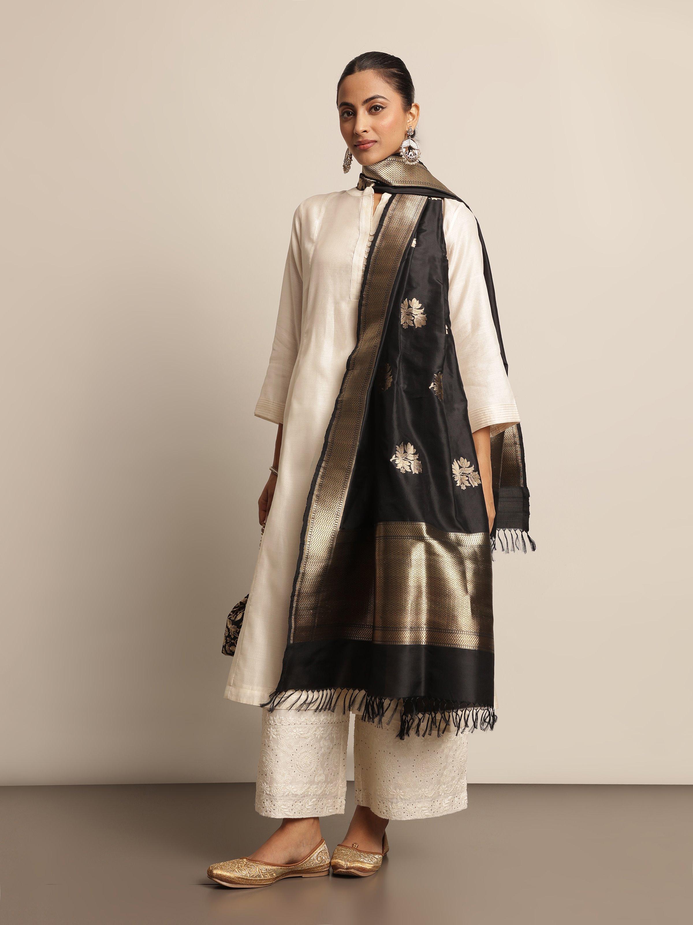 Lifestyle shot showing traditional styling with rich woven details.
