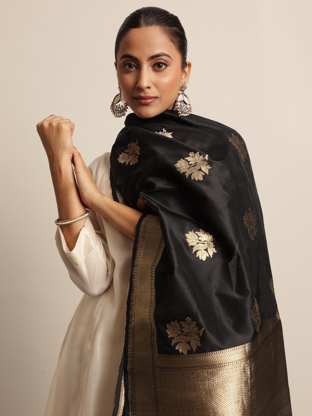 Styled image displaying the luxurious texture and gold motifs.