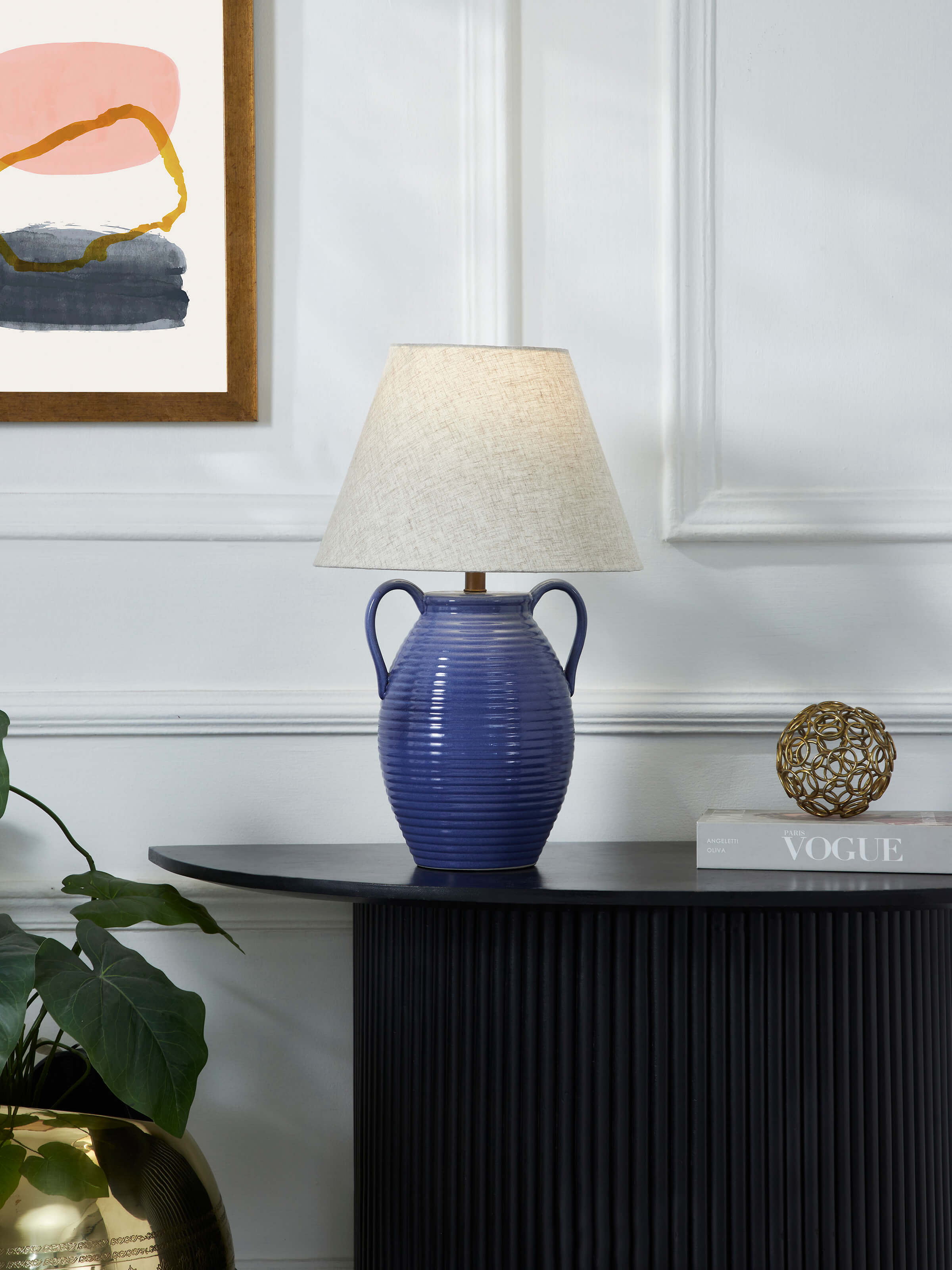 Close-up view of the off-white studio pottery & cotton table lamp, highlighting the texture and craftsmanship.