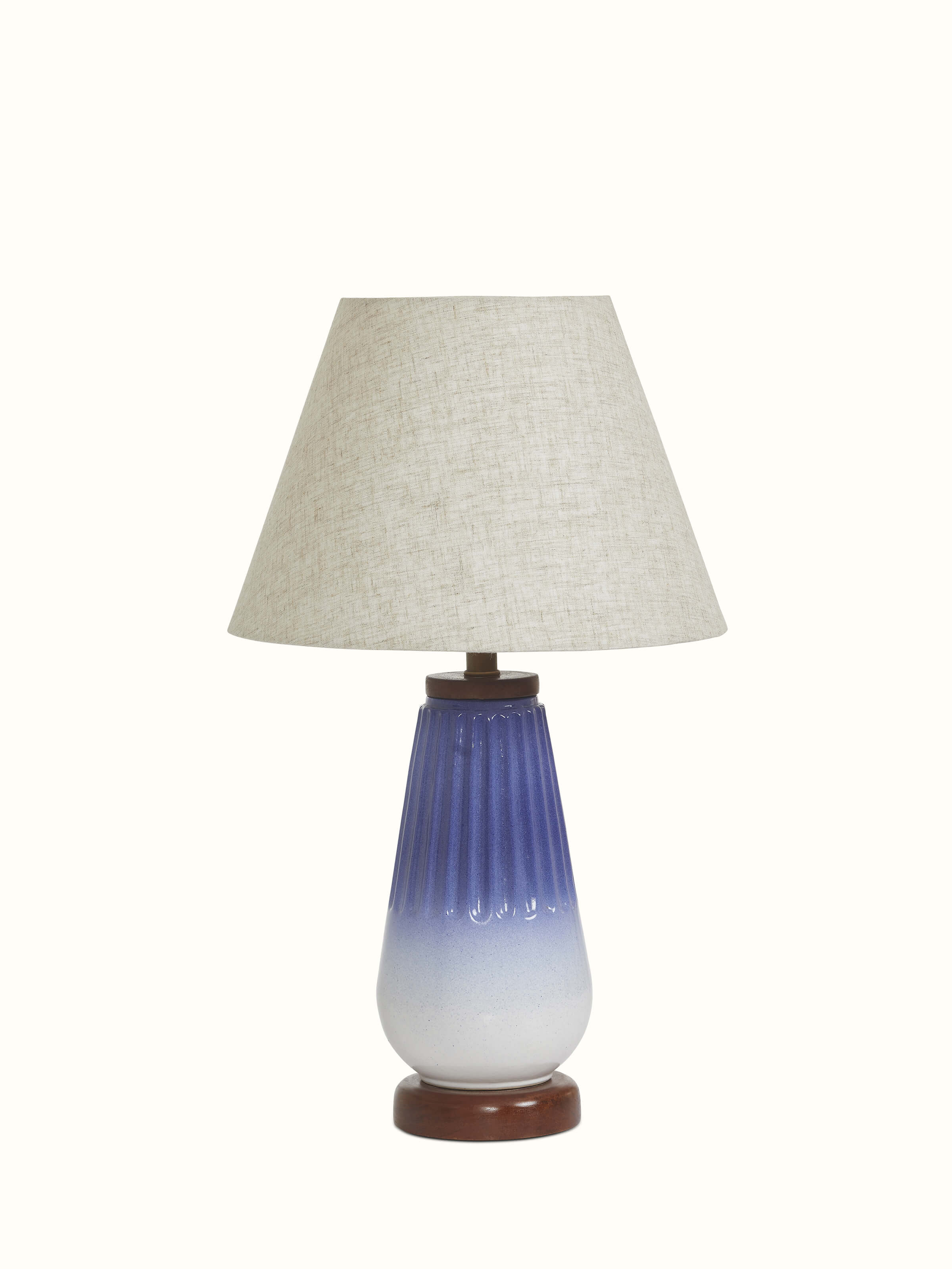 Front view of Studio pottery & cotton table lamp in grey color showcasing elegant design and fabric shade.