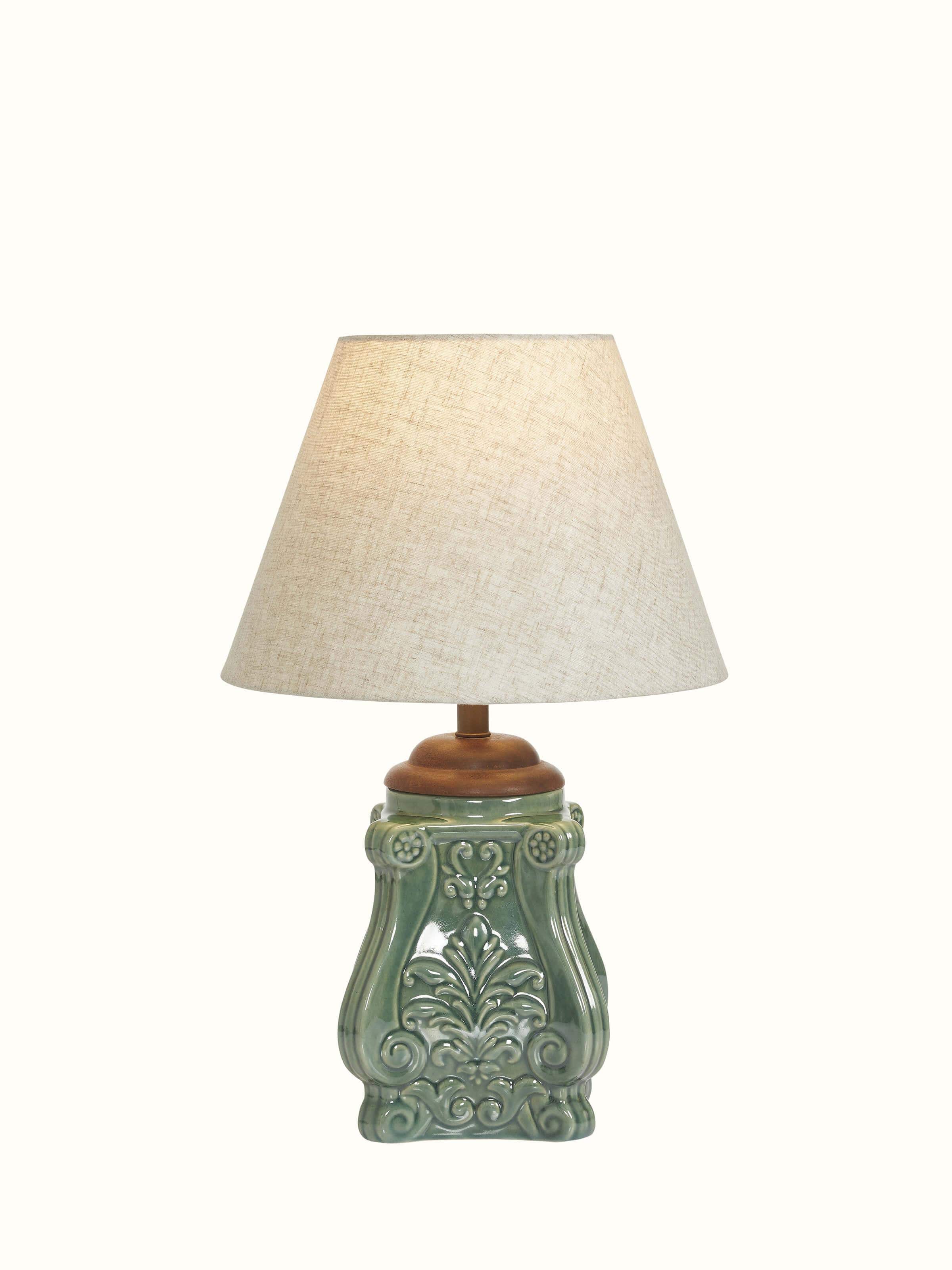 Studio pottery and cotton LED table lamp with a stylish design, featuring a blue ceramic base and a soft cotton shade.