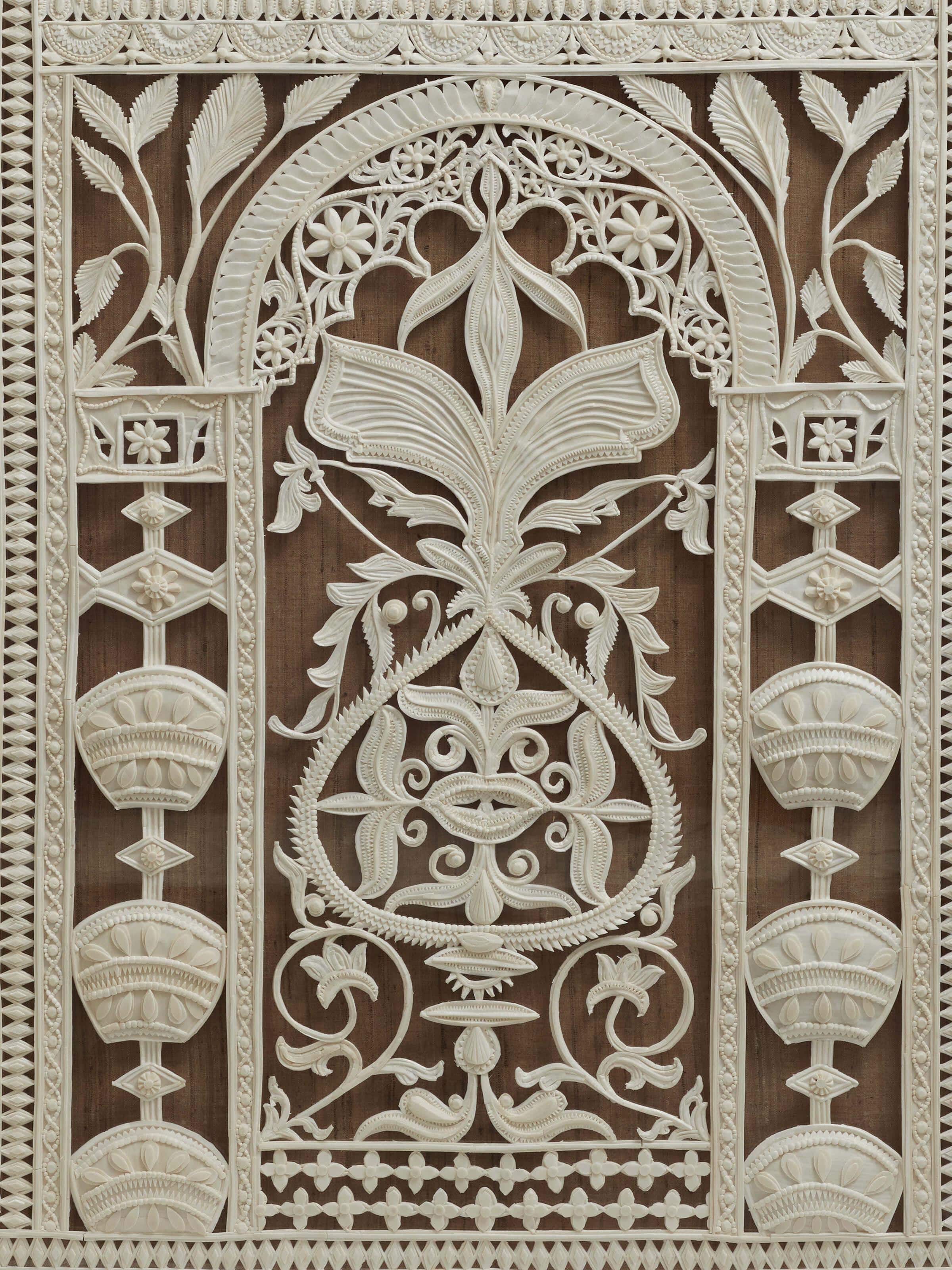 Side view of Sholapith Aagamya Wall Hanging highlighting intricate patterns and traditional Sholapith work.