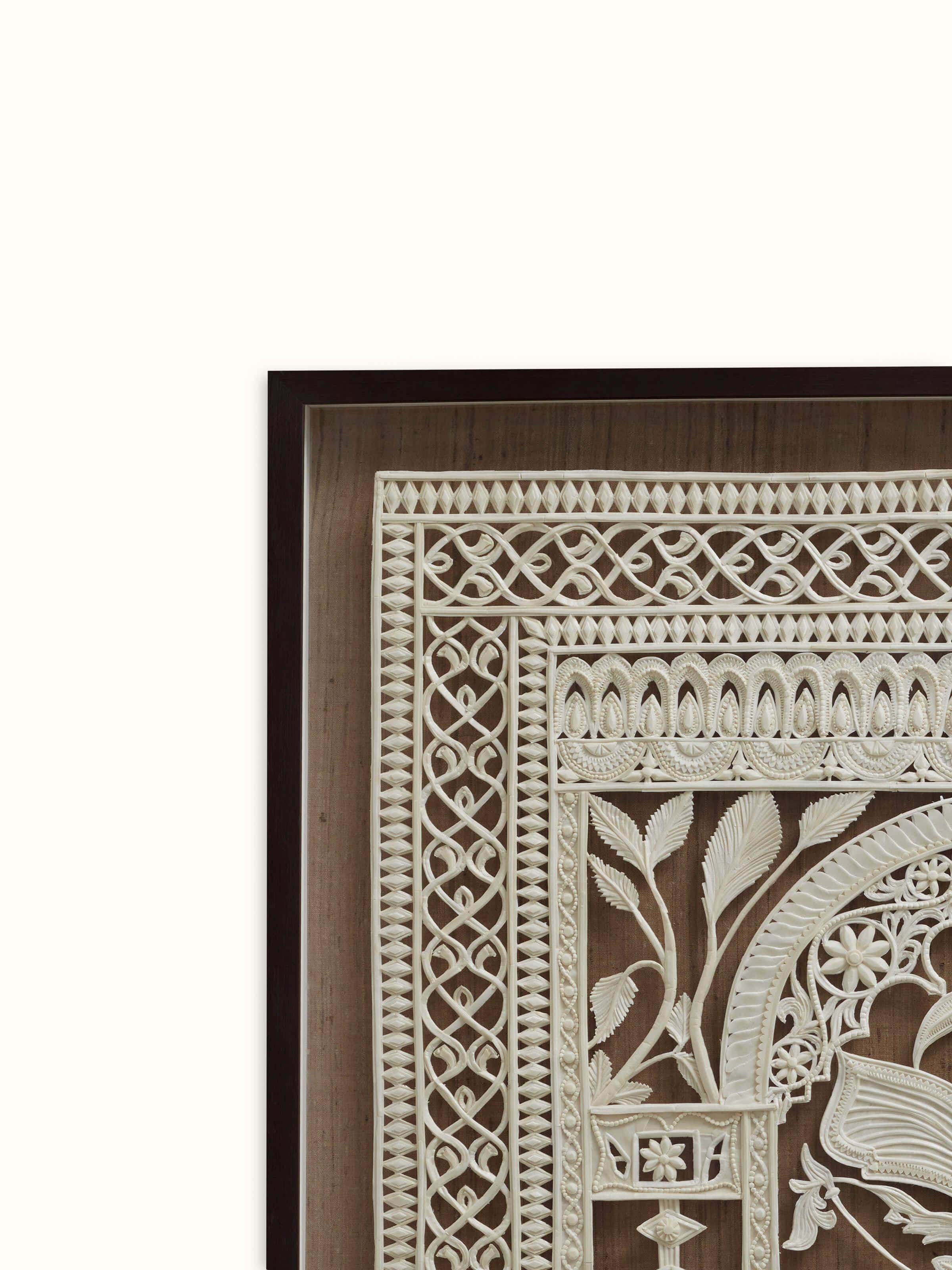 Close-up of Sholapith Aagamya Wall Hanging focusing on detailed design and texture of the wall hanging.