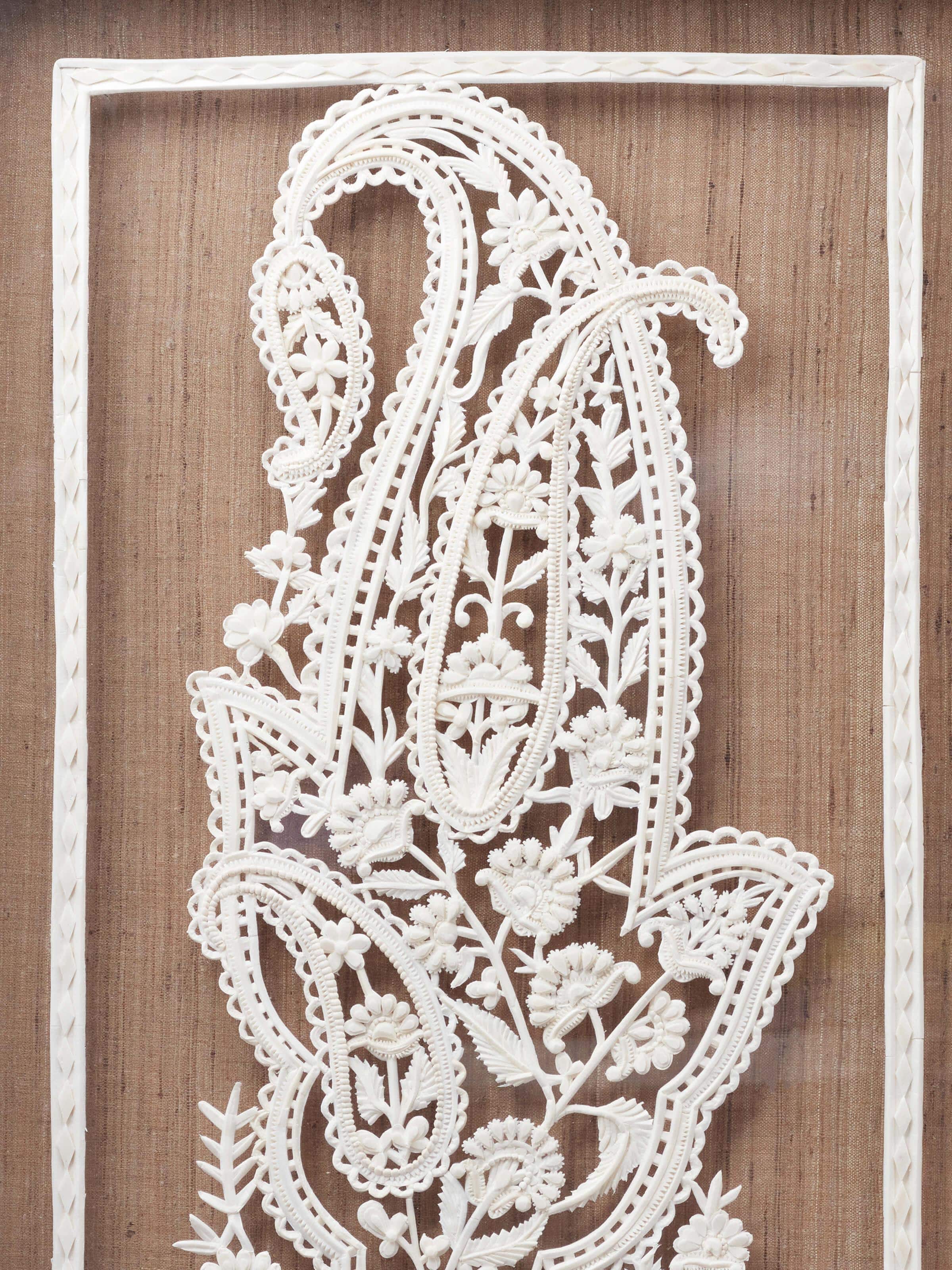Detailed view of Sholapith Kalga Wall Hanging emphasizing the texture and fine details of the artwork.