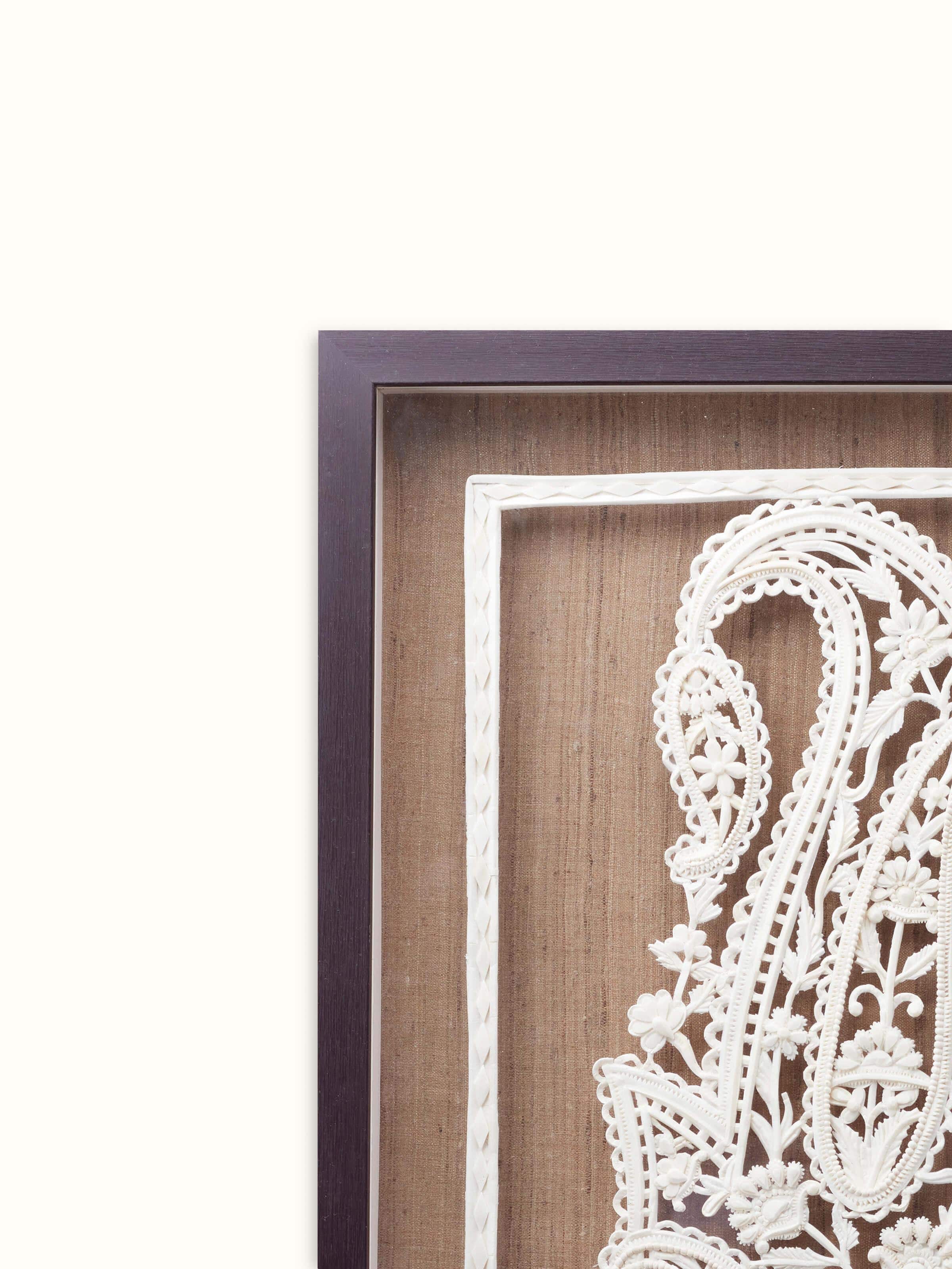 Close-up view of Sholapith Kalga Wall Hanging focusing on the artistic patterns and craftsmanship.